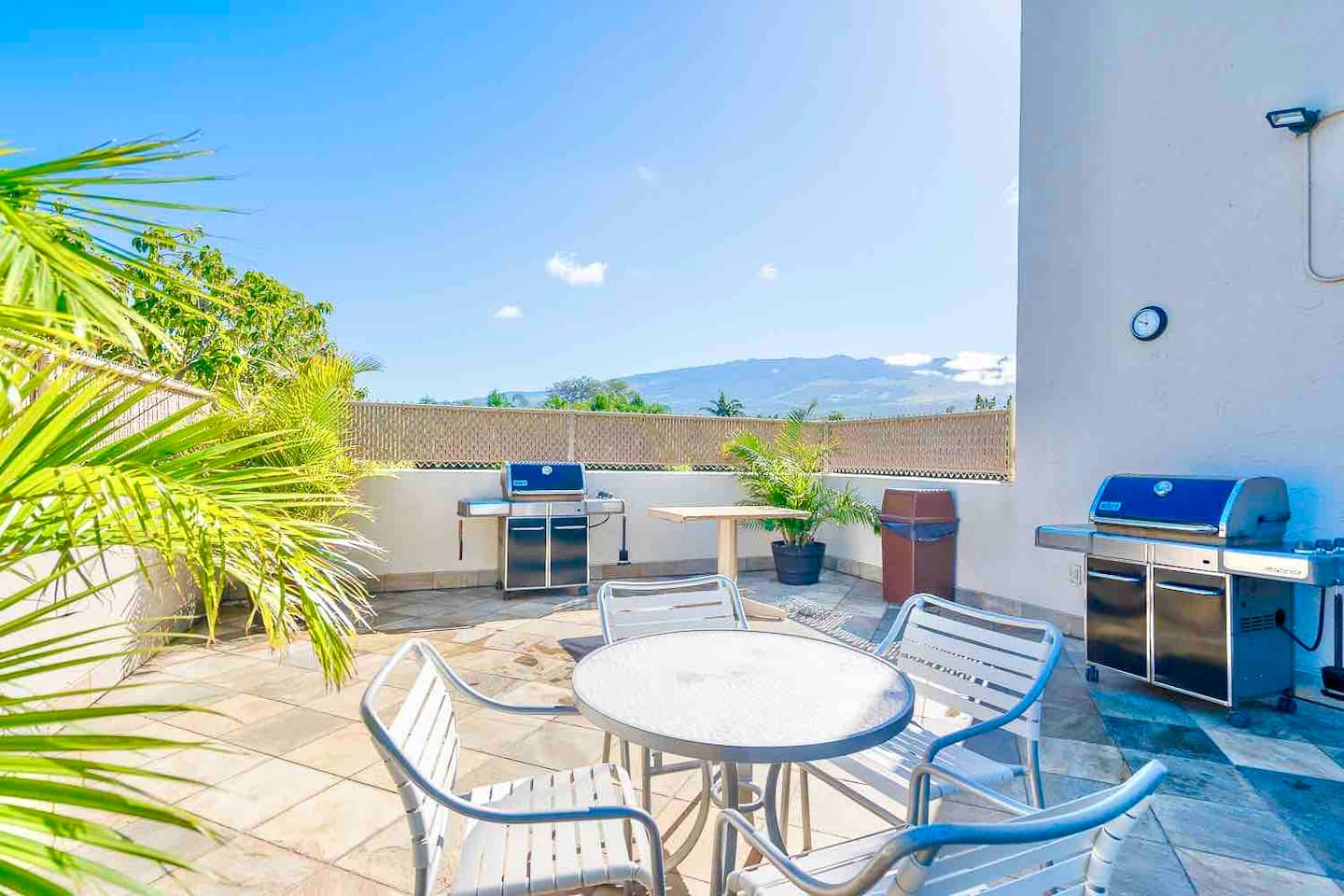 Dining area and bbq grills at the pool 