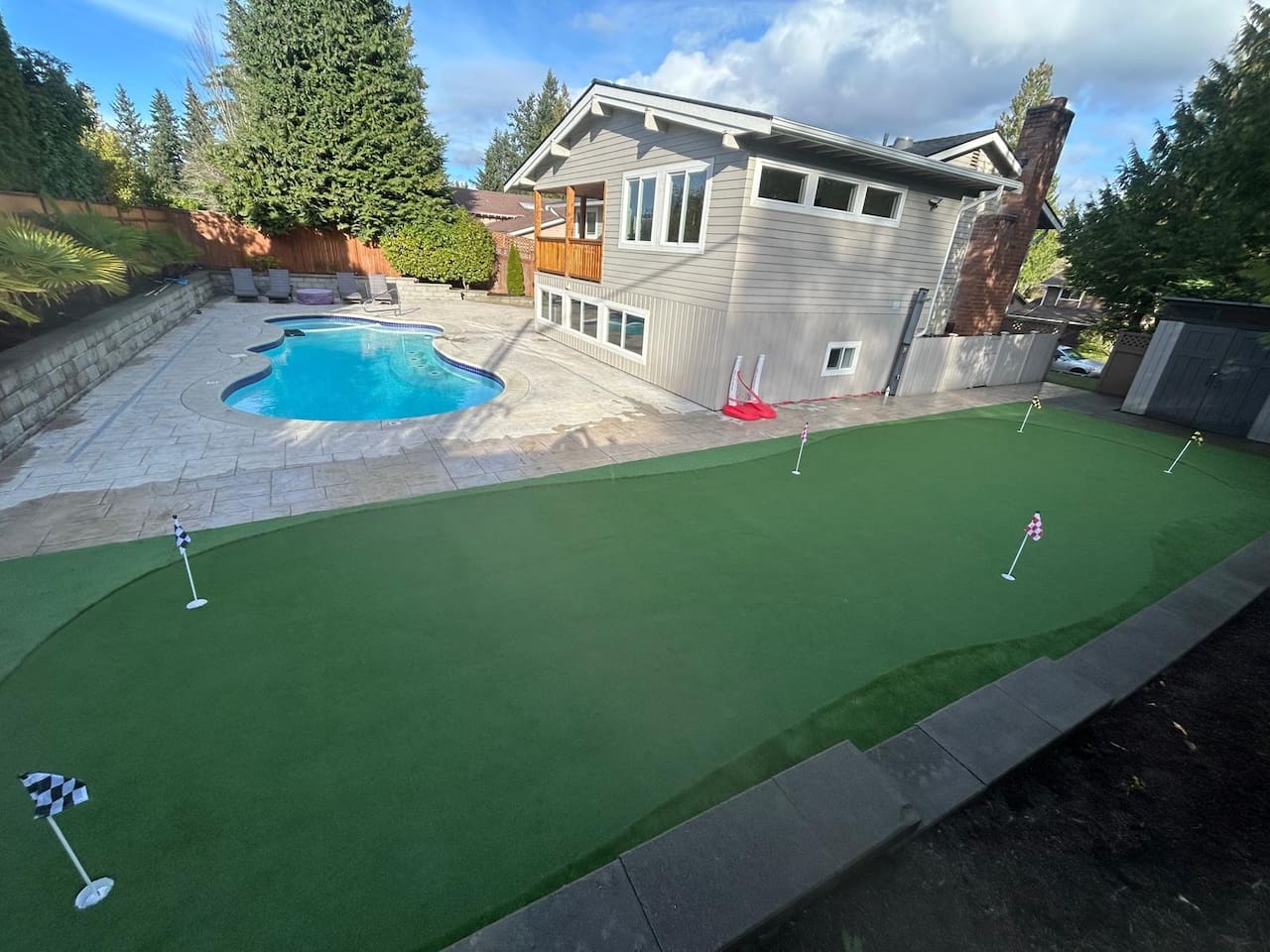NEW! “Enjoy the best of both worlds—our backyard oasis features a sparkling private pool and a fun mini-golf course, perfect for families and groups.”