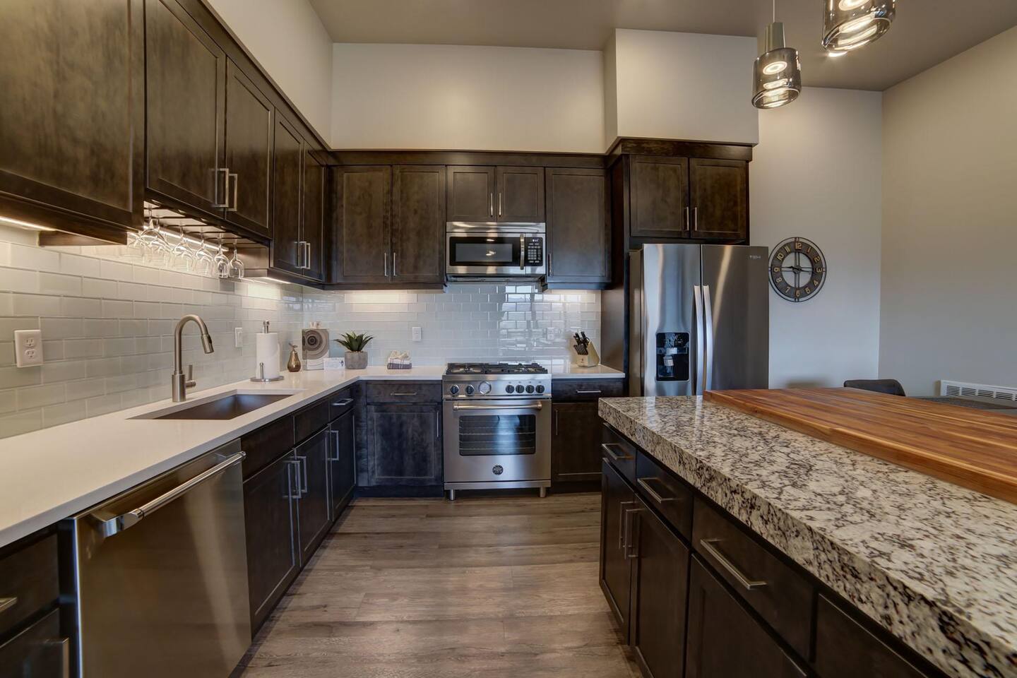Modern luxurious kitchen with island bar and deluxe appliances