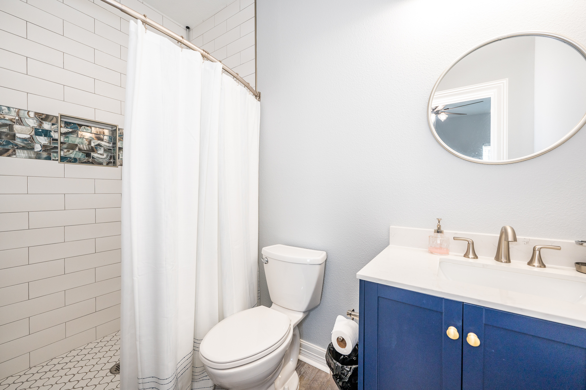 primary bedroom en suite bathroom with walk in shower