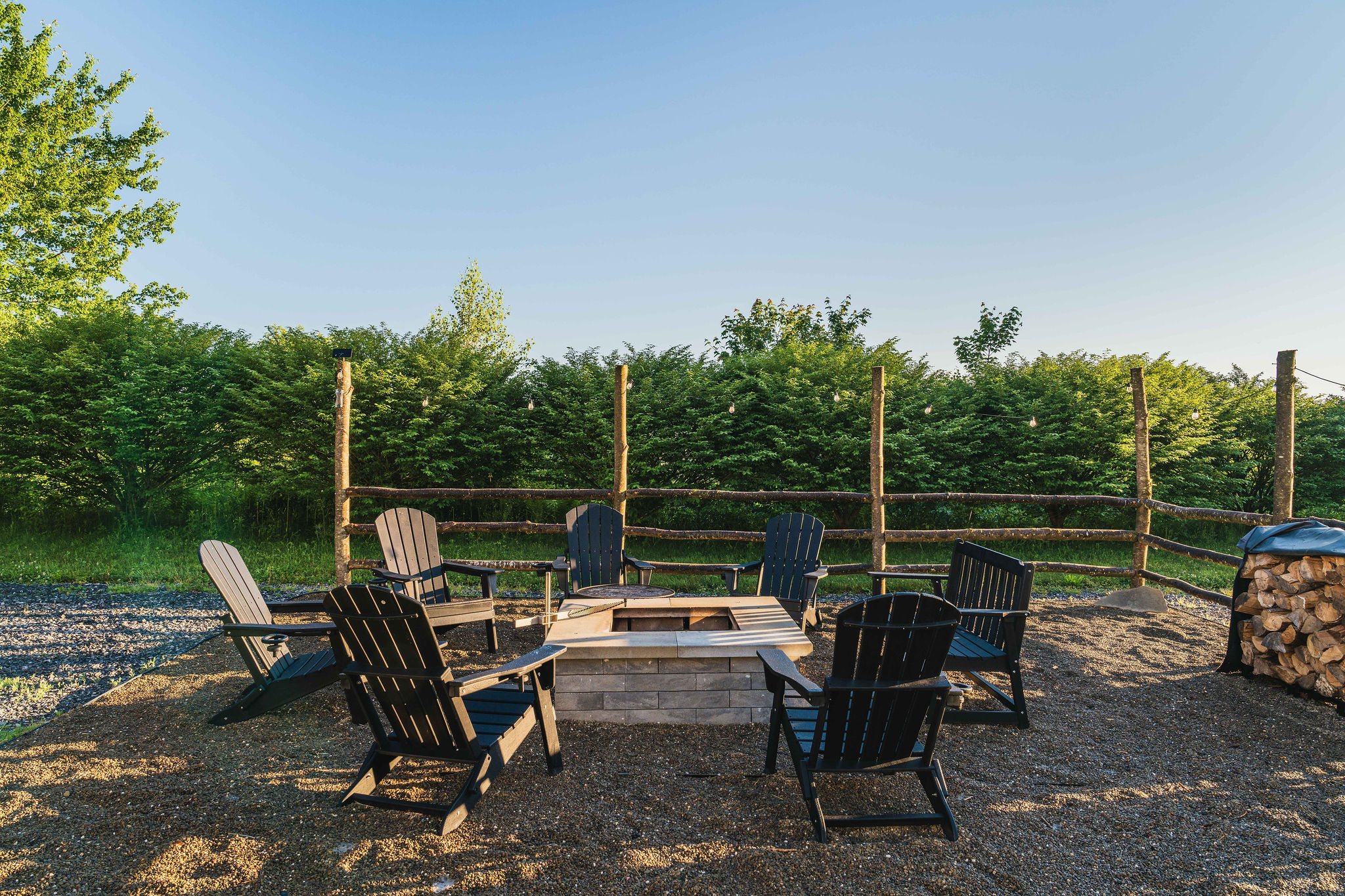 🪑 Adirondack chairs facing the long-range view.