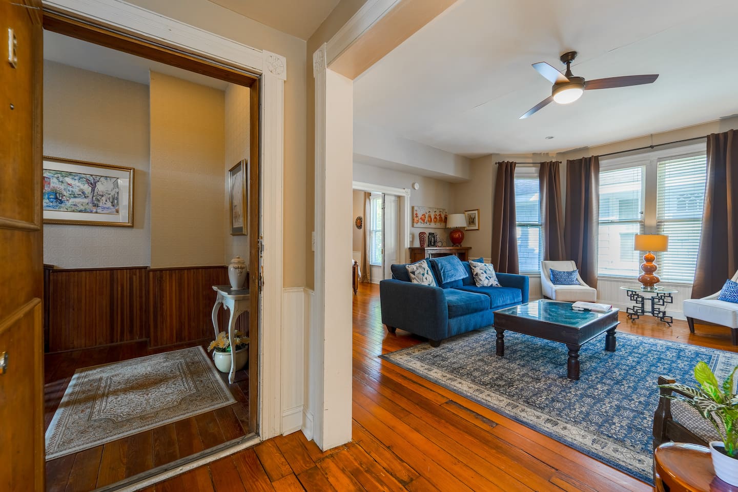 Enter your spacious living room with elegant yet comfortable seating. Decorative historical decor and touches throughout. Large oversized windows for a great start to the day, with blackout curtains for privacy in the evening. New ceiling fan.