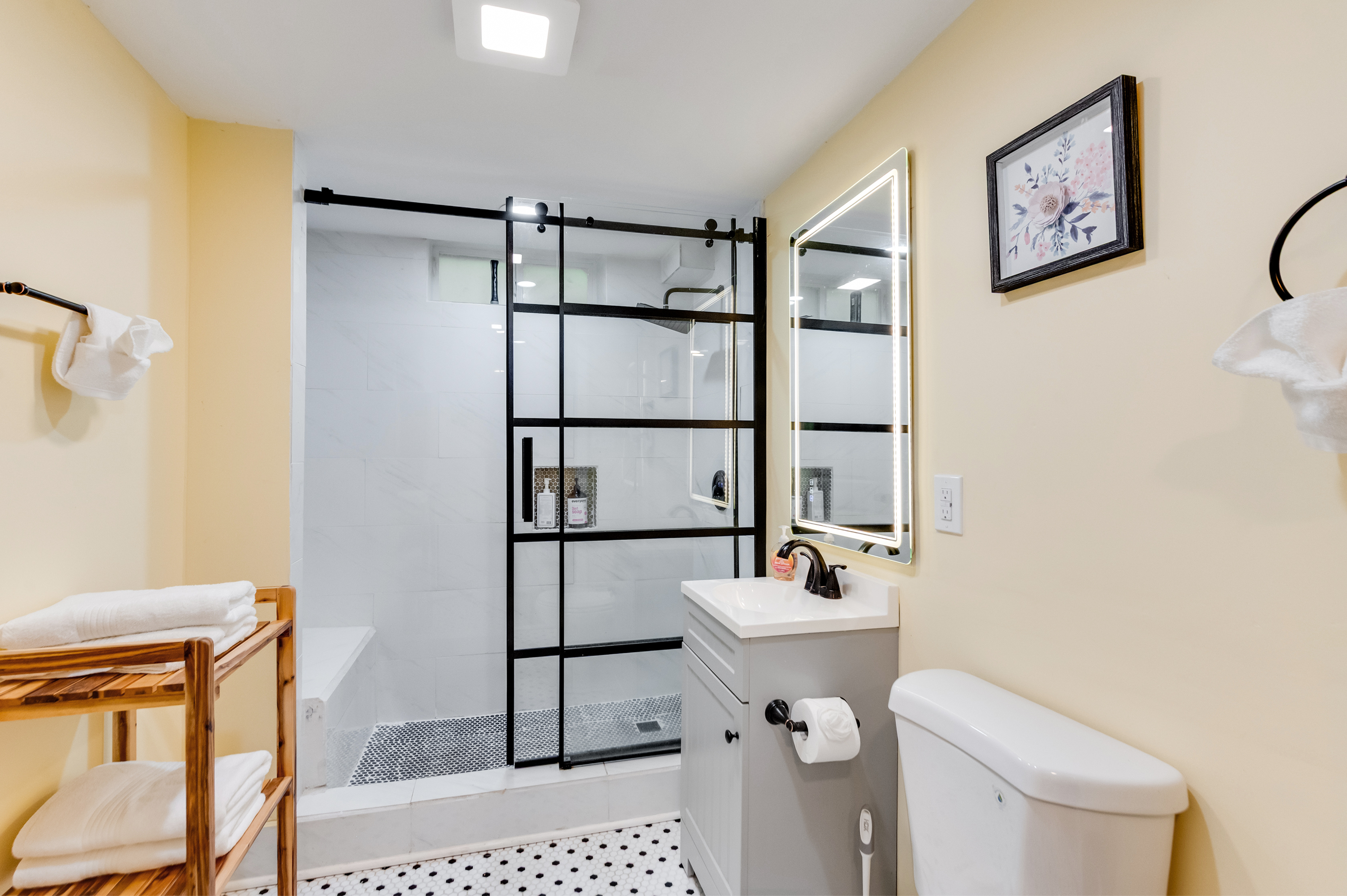 Downstairs Bathroom 3: Stylish space with sleek finishes and a spacious shower for ultimate relaxation!