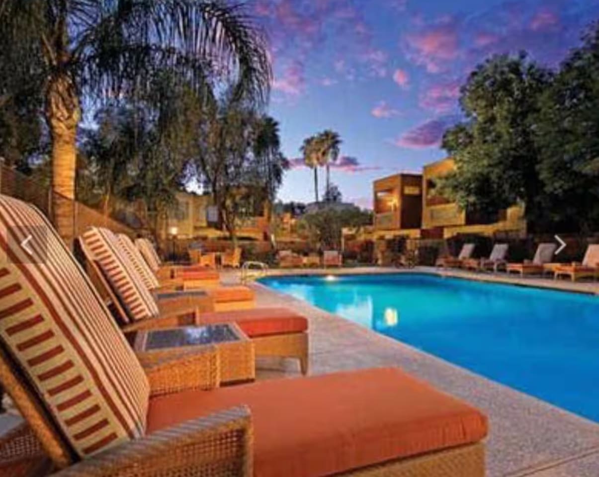Wind down poolside as the sky turns pink — the perfect way to close out a day in the desert.