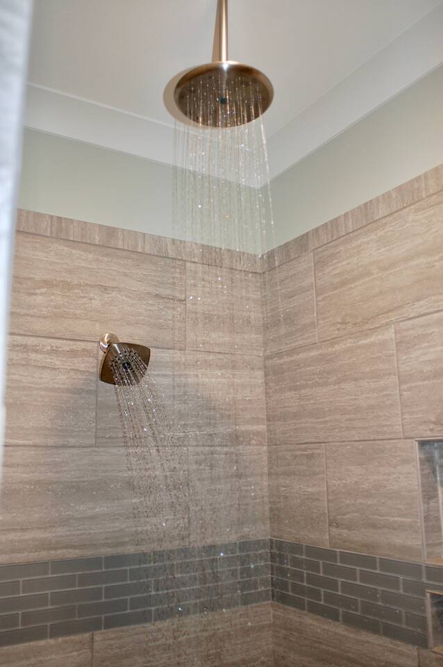 Enjoy the dual shower heads in this oversized walk-in shower!