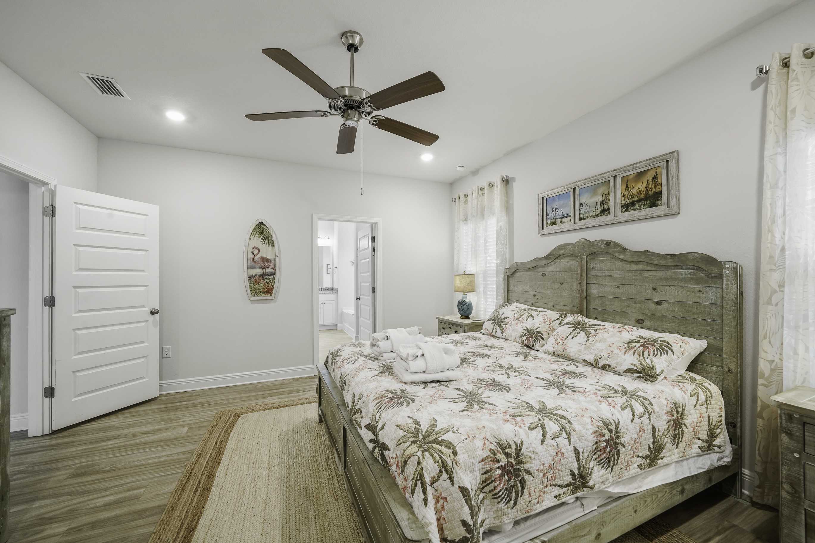 Bedroom 1: Primary Suite- Comfortable King Room with Ceiling Fan, Storage, Smart TV & En-Suite Bathroom