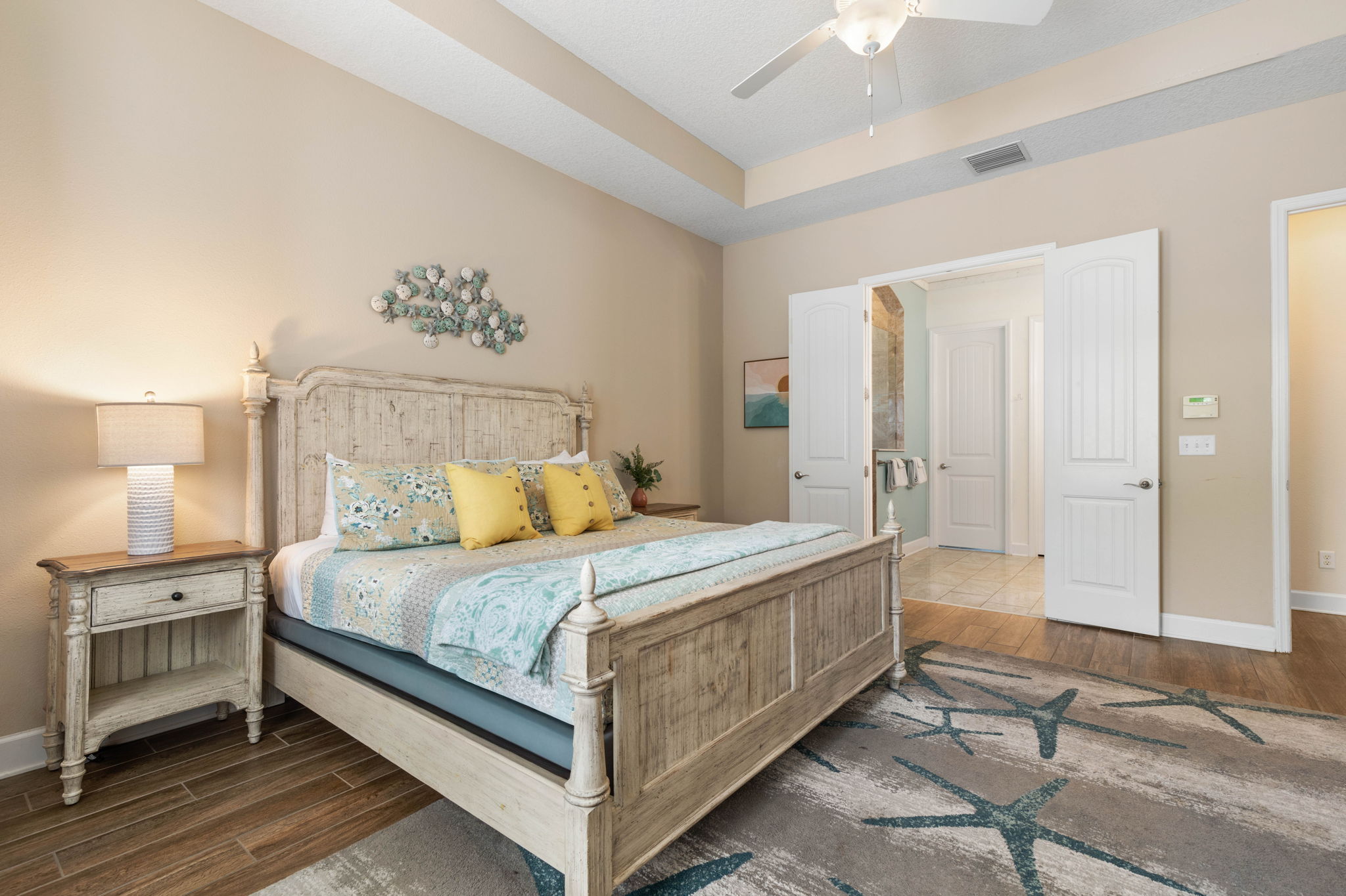 End the day in this serene coastal suite—wash off the salt, sink into bed, and let the quiet settle in. With a spa-like bath just steps away, it’s the kind of restful retreat that makes every beach day feel even sweeter.