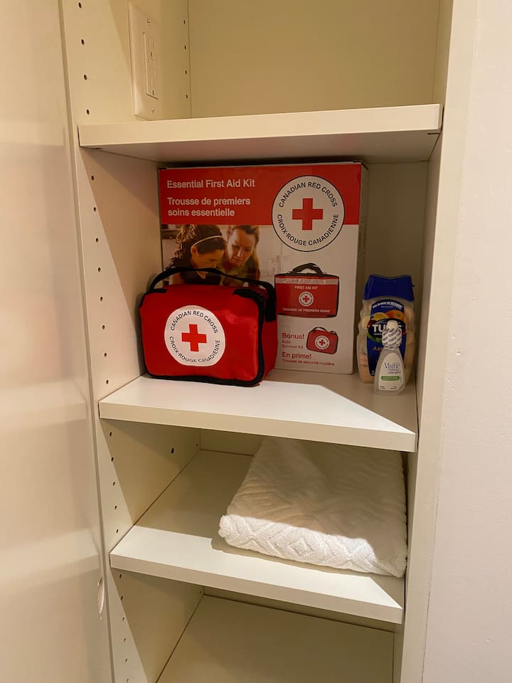 First aid kit is in the tall cabinet in the bathroom