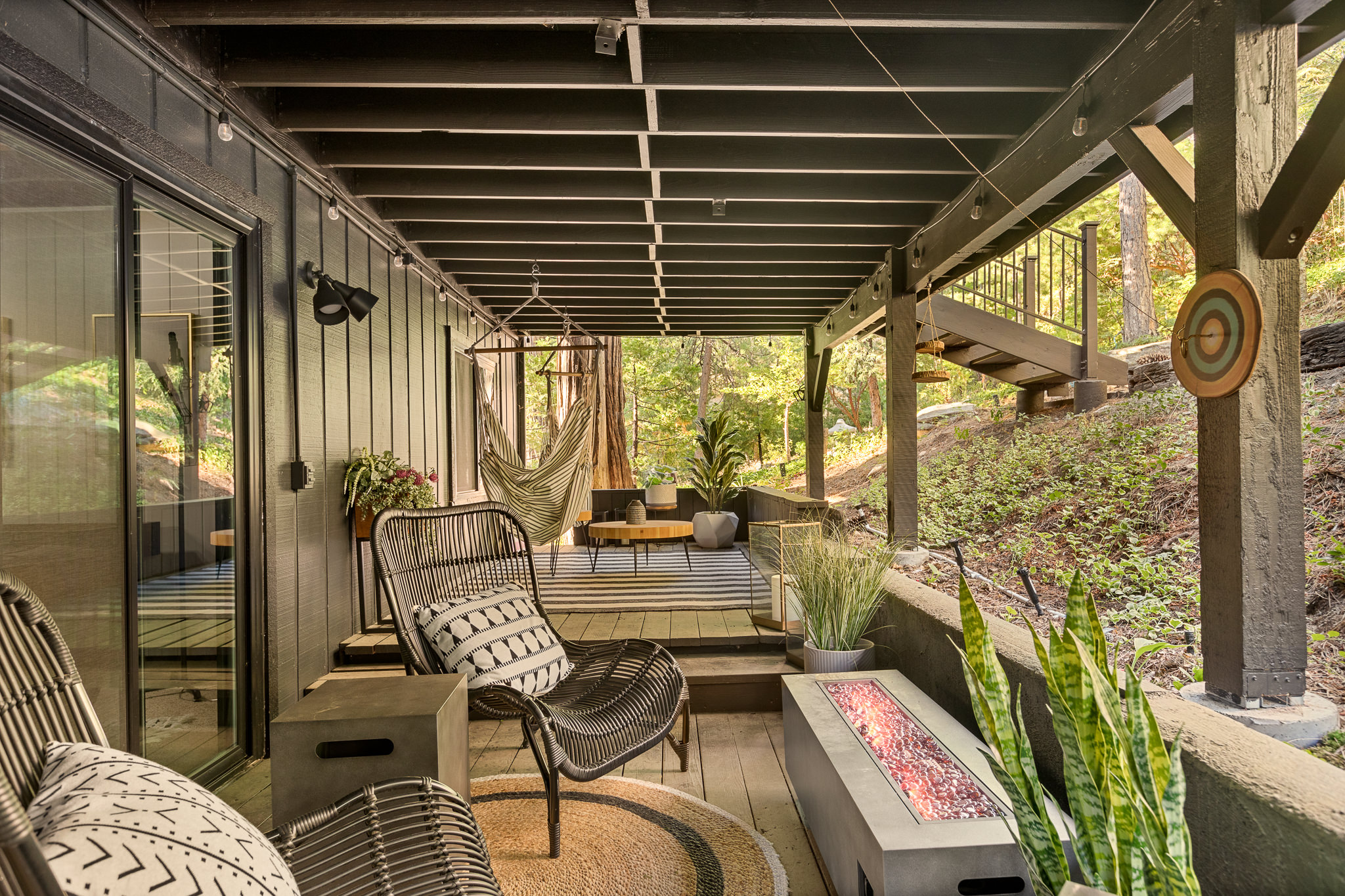 Experience the warmth of our outdoor fire pit, conveniently located just off the family room on the lower floor.   It's the perfect spot to cozy up and unwind.