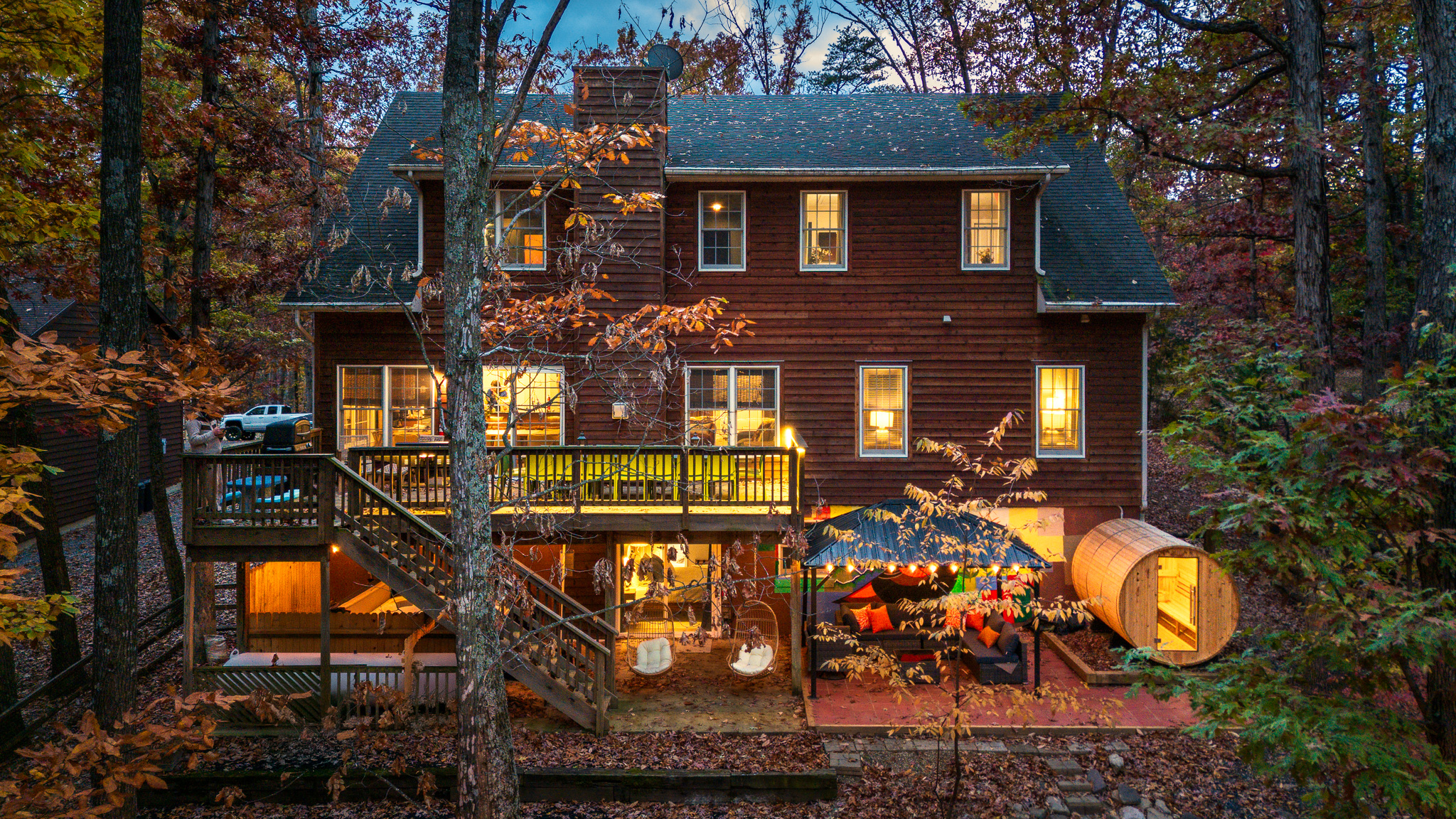 Your three-story mountain retreat, glowing with warmth and ready for unforgettable family time