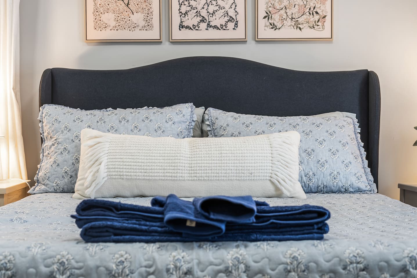 Freshly made and ready for you, with towels laid out for added comfort.