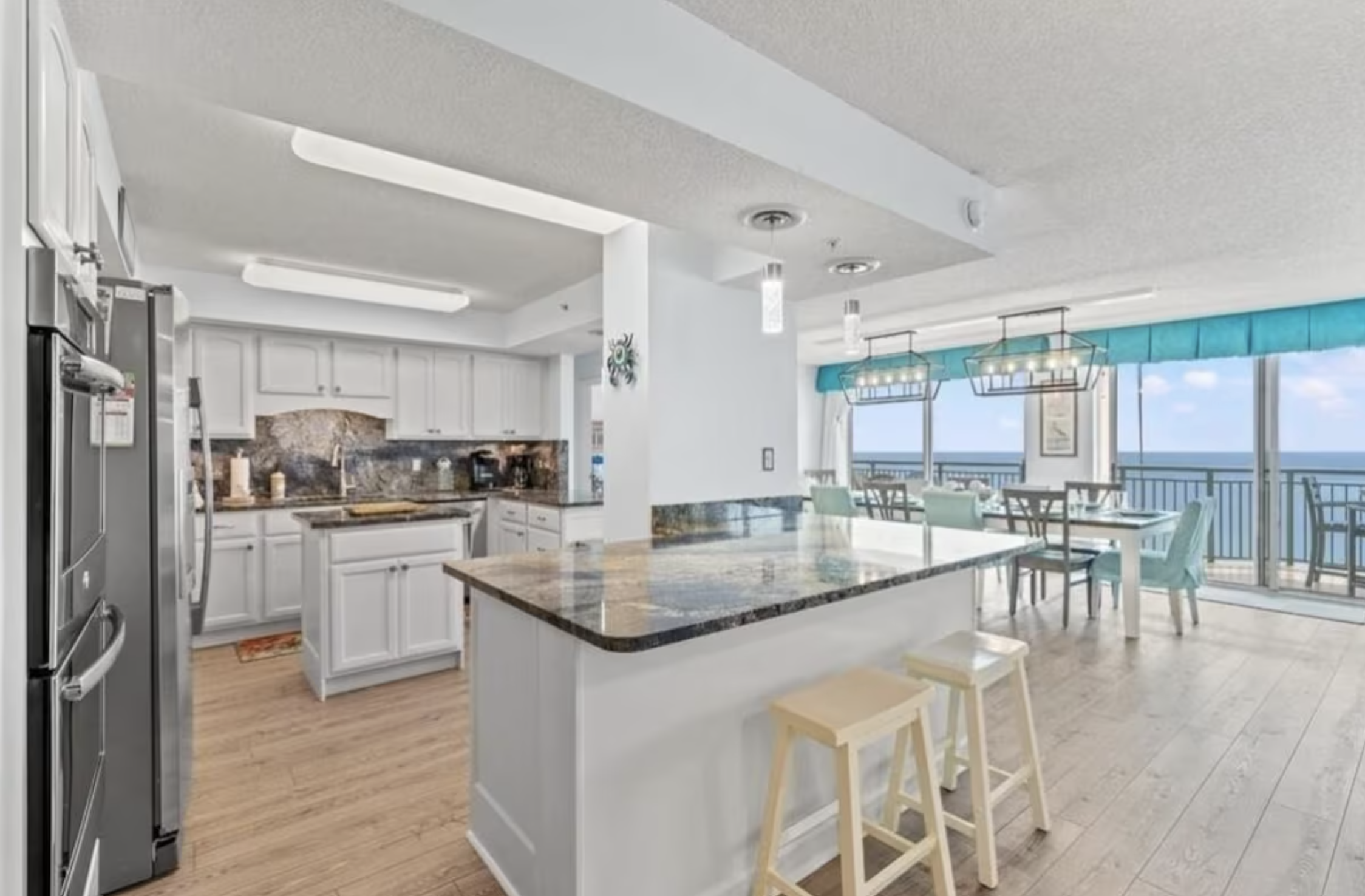 The kitchen also has a large breakfast bar for dining or for serving up great family meals