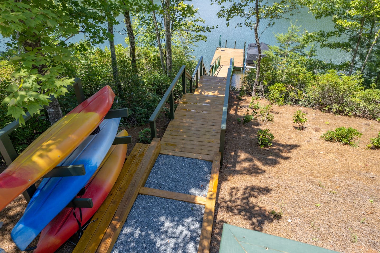 Private walkway leading down to lake adventures with canoes etc for you to use