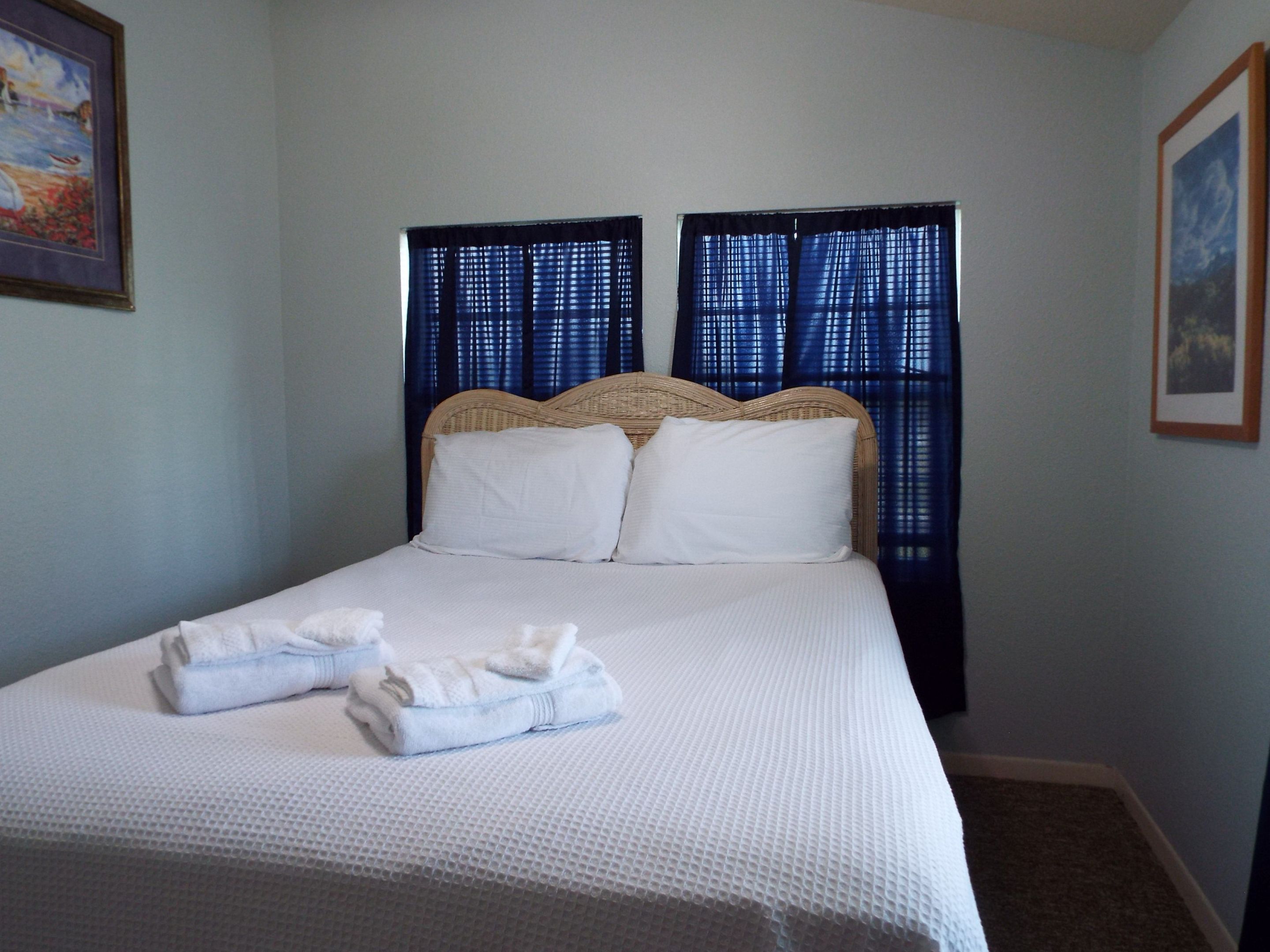 Queen bed with luxury linens