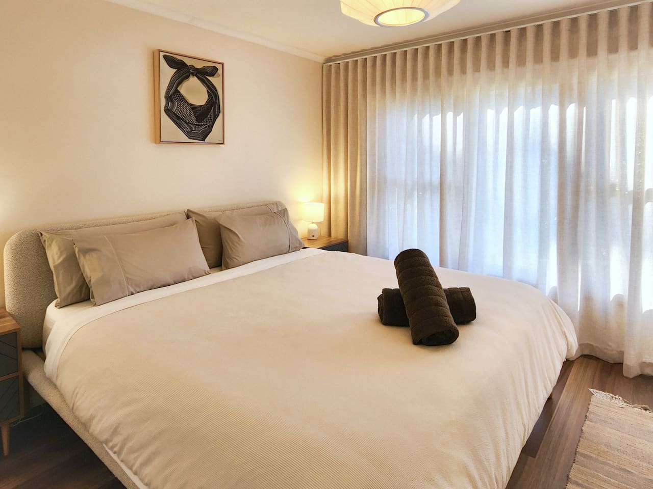 The bed in the master is a new comfy King. All bedding is 500 TC+.The king and queen rooms have motorised blinds. There is plenty of cupboard space.You can find extra blankets, pooch blankets and a portacot stored here too.