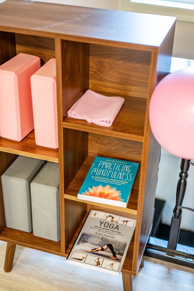 Take a quiet moment with our small reading nook featuring wellness and mindfulness books for a peaceful cabin reset.