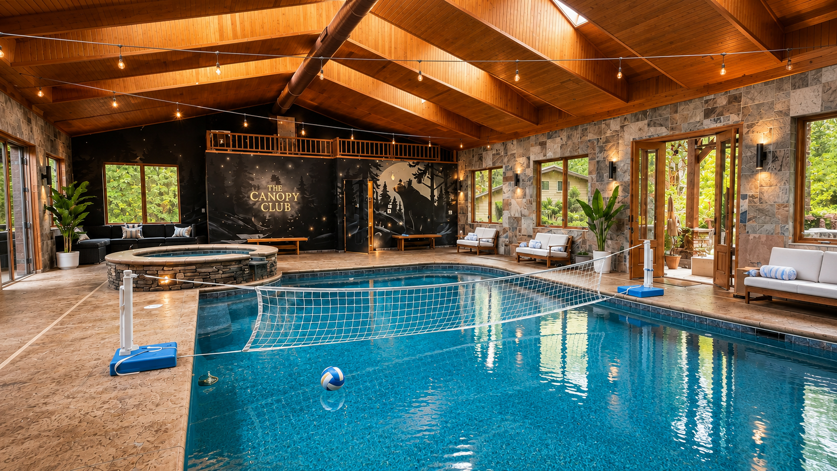{The Canopy Club} Your private indoor pool retreat, complete with pool volleyball, a stone hot tub, cozy lounge seating, and a dramatic forest-inspired backdrop—ready for year-round fun, rain or shine.