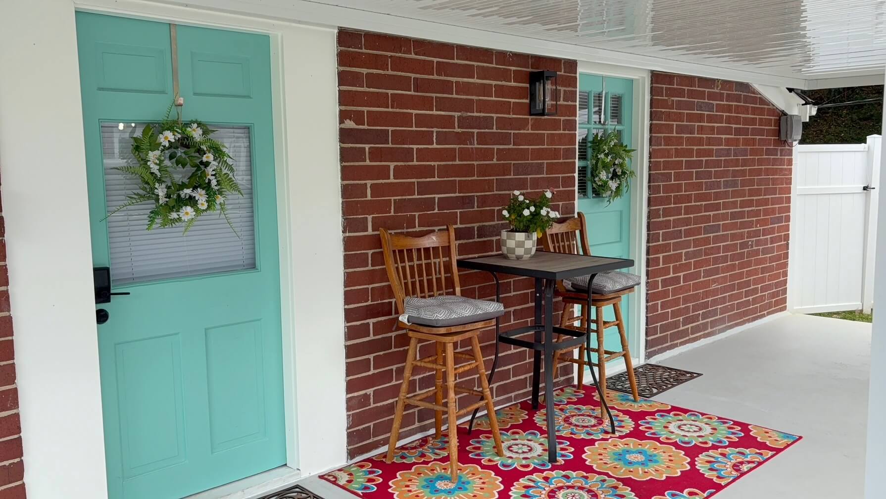 Seating Area underneath the covered porch, entry