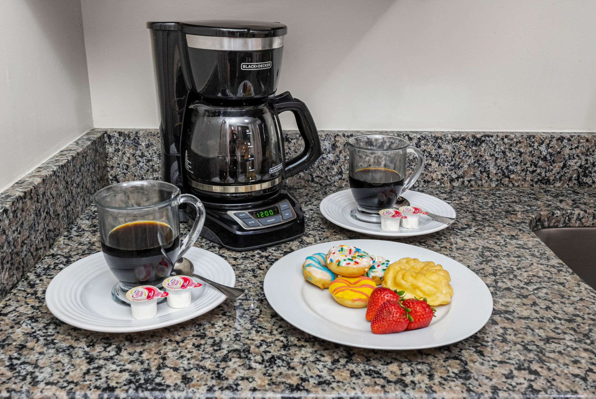 Kick off your day with a fresh cup from the Keurig-style coffee maker, with pods conveniently provided.