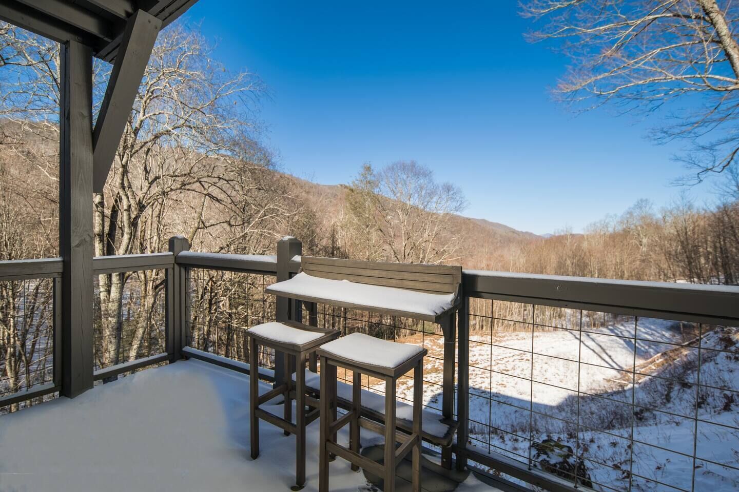 Outdoor seating located on the back patio of unit #4. 