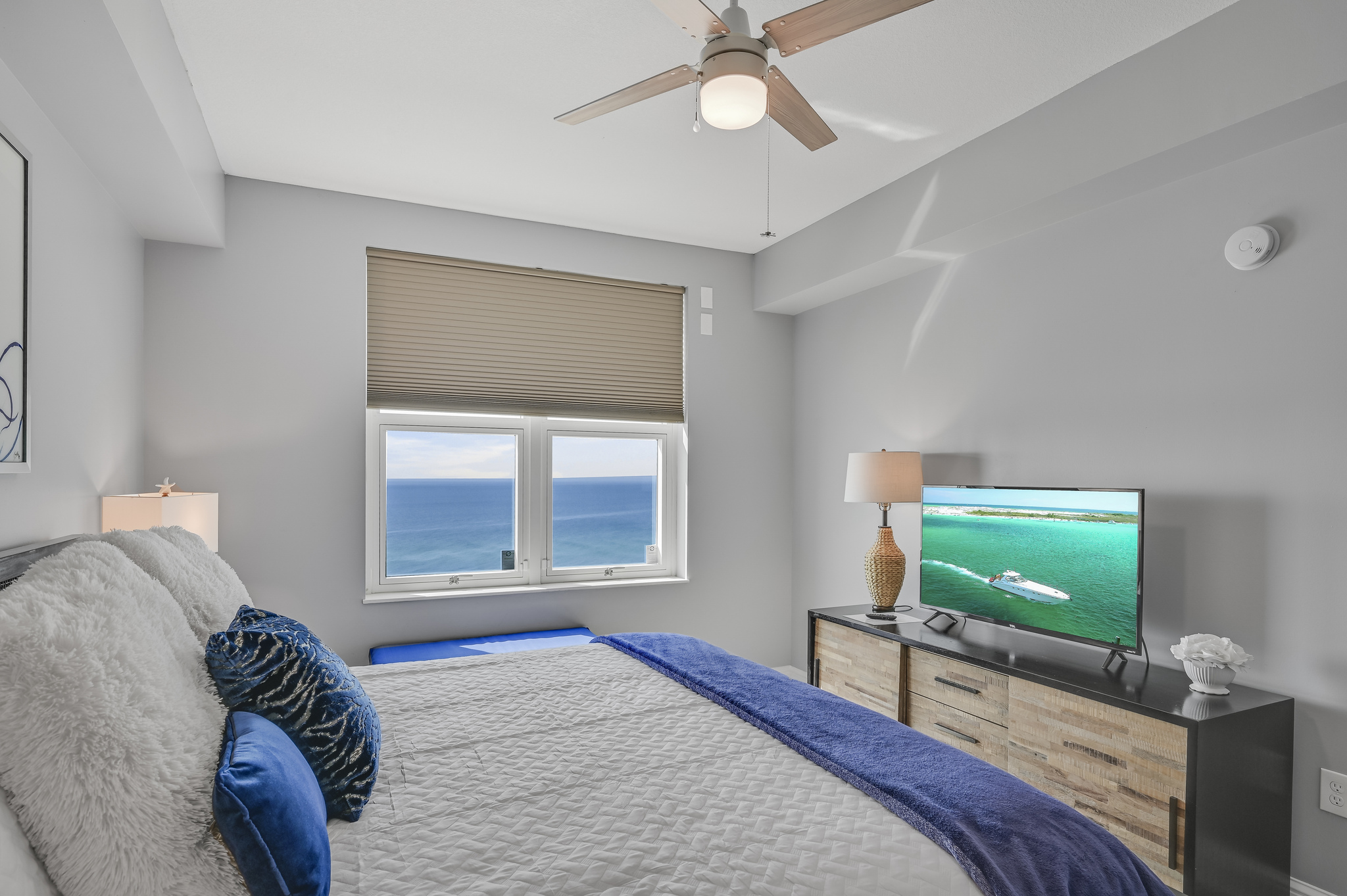 The second bedroom has GULF VIEWS, a King bed, 50" Smart TV, and private bath