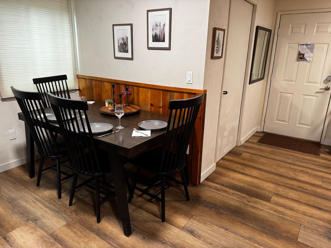 Four chairs and a bench accommodate the whole family in this space. We also offer a chair-mounted booster for the little ones. 