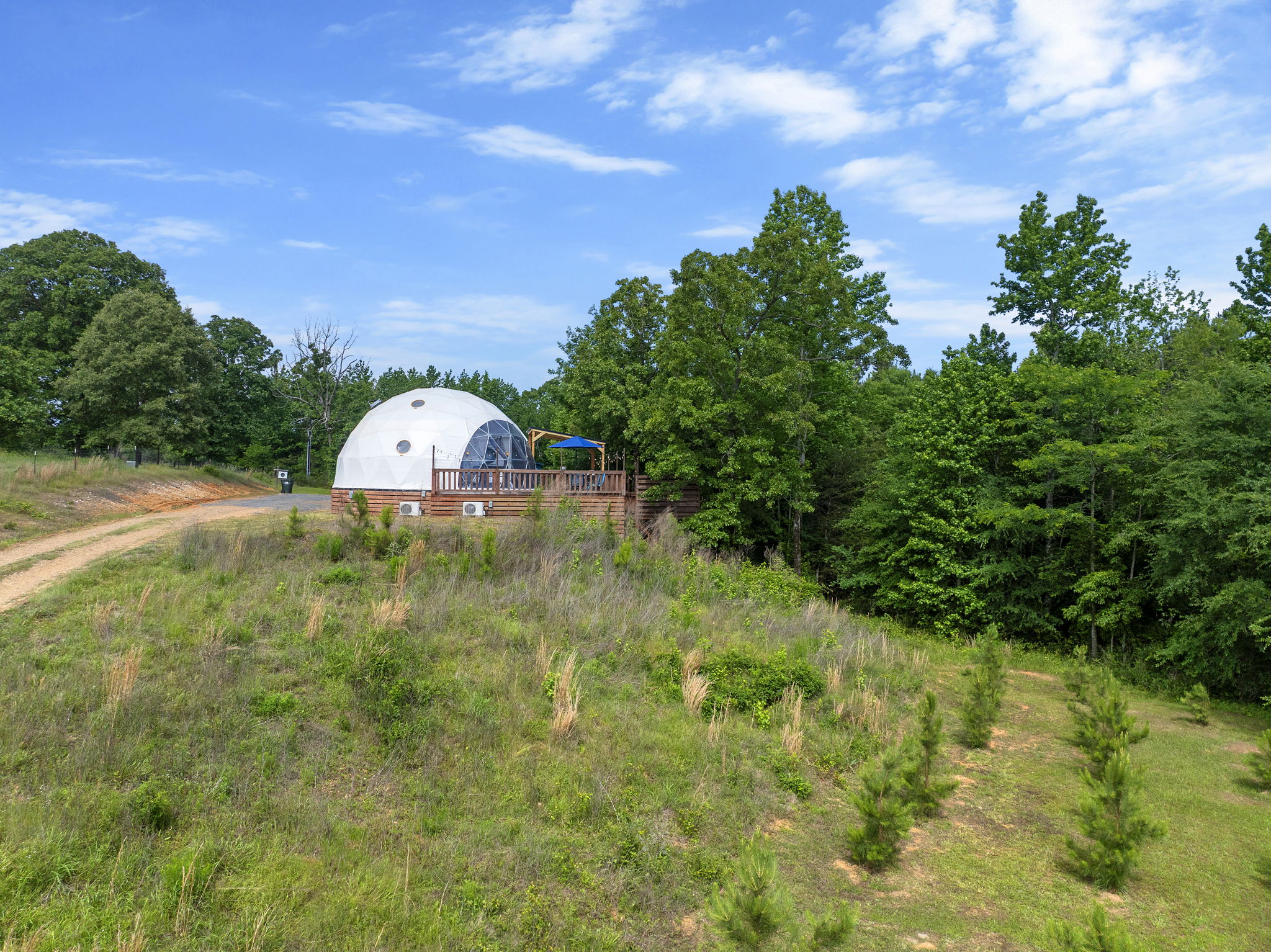 Dome sits up on a hill and looks over the 15 acre property