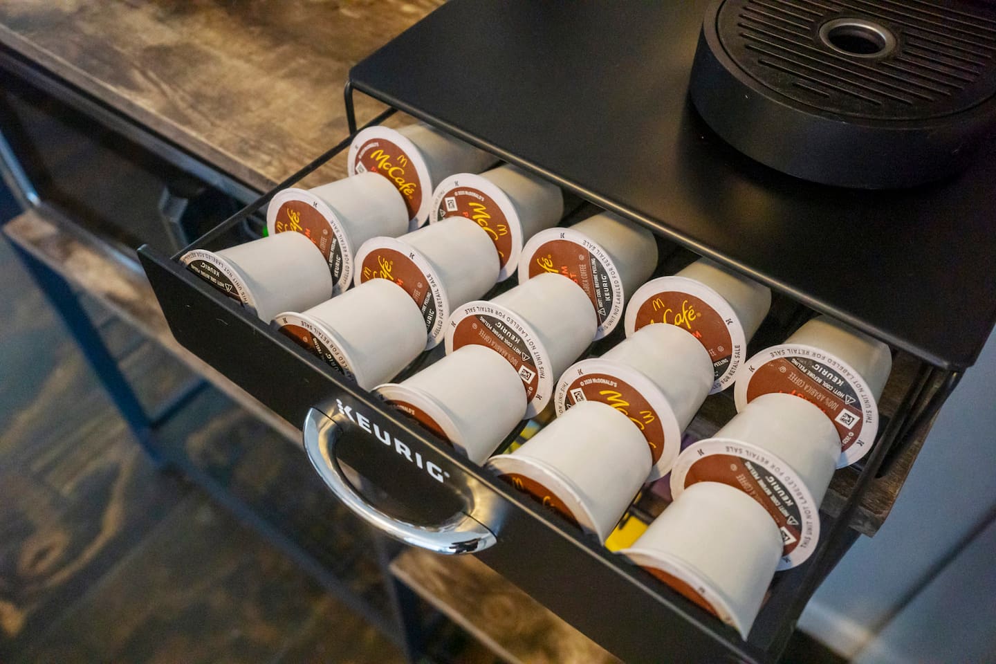 Kitchen featuring a cozy coffee nook stocked with Keurig pods, perfect for enjoying a fresh cup of coffee anytime.