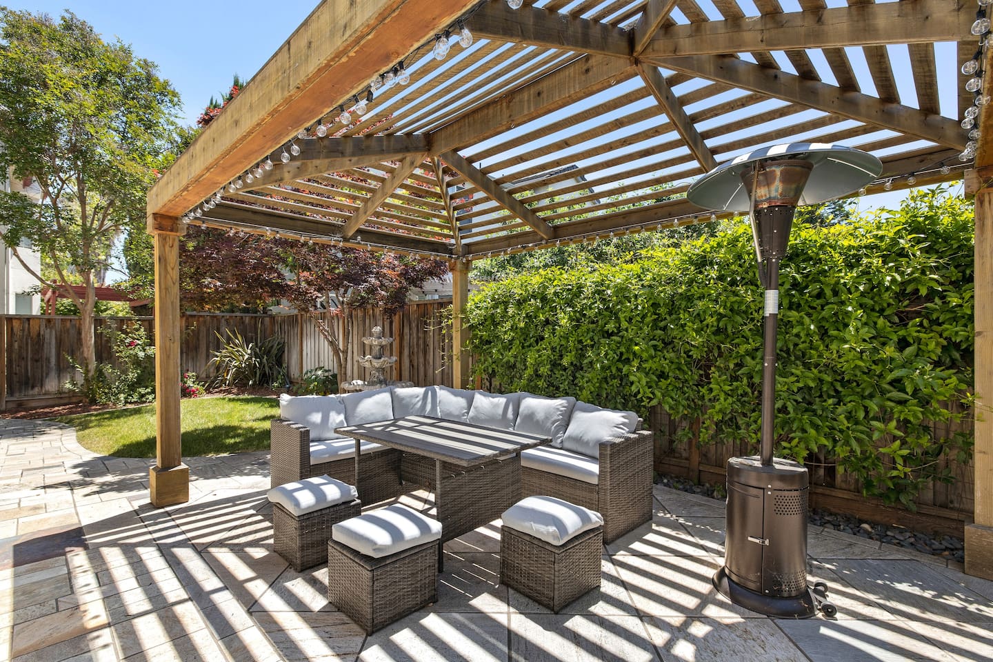 Relax and enjoy the outdoors in our charming backyard