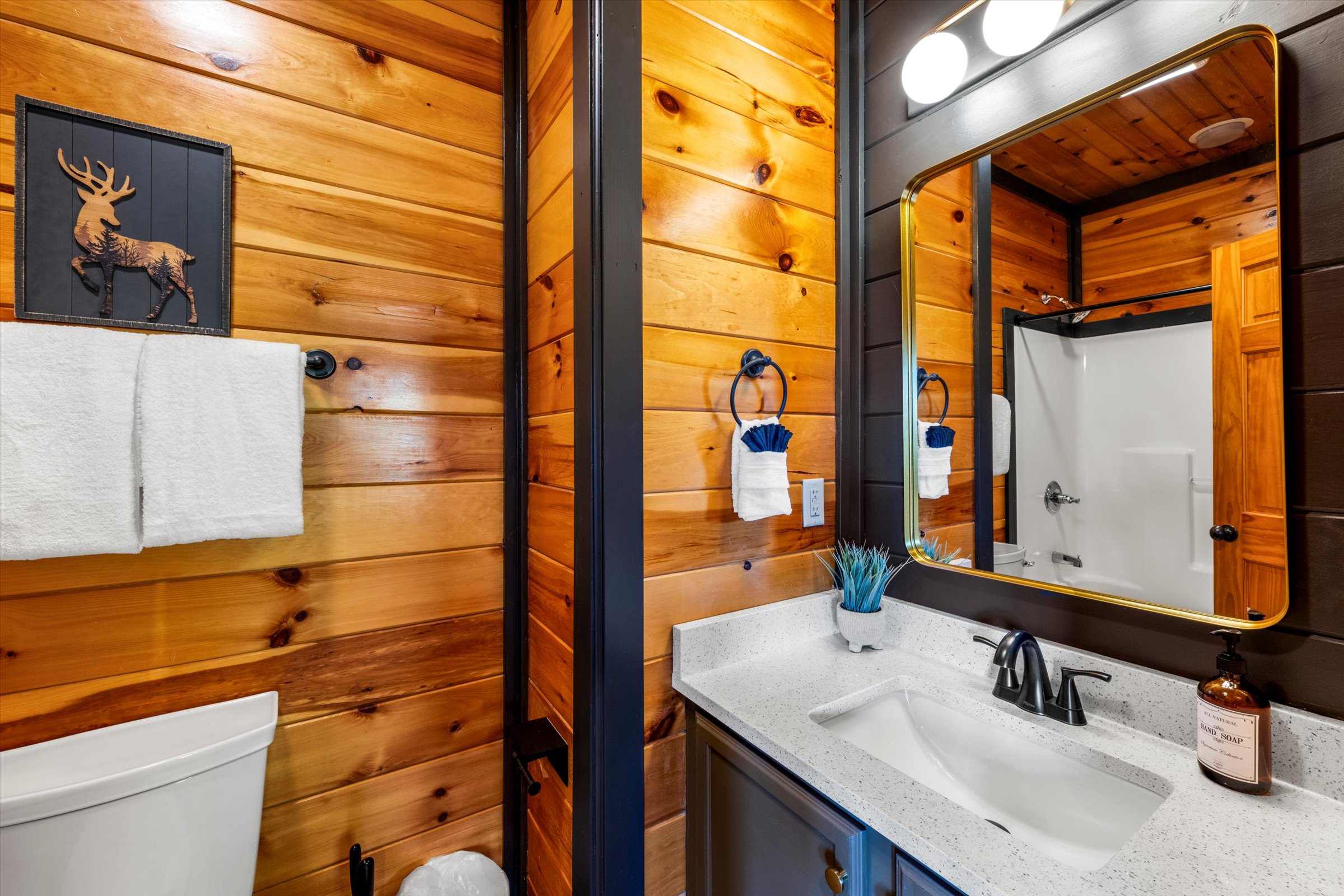 Bedroom 2 has a private bathroom with shower/tub.