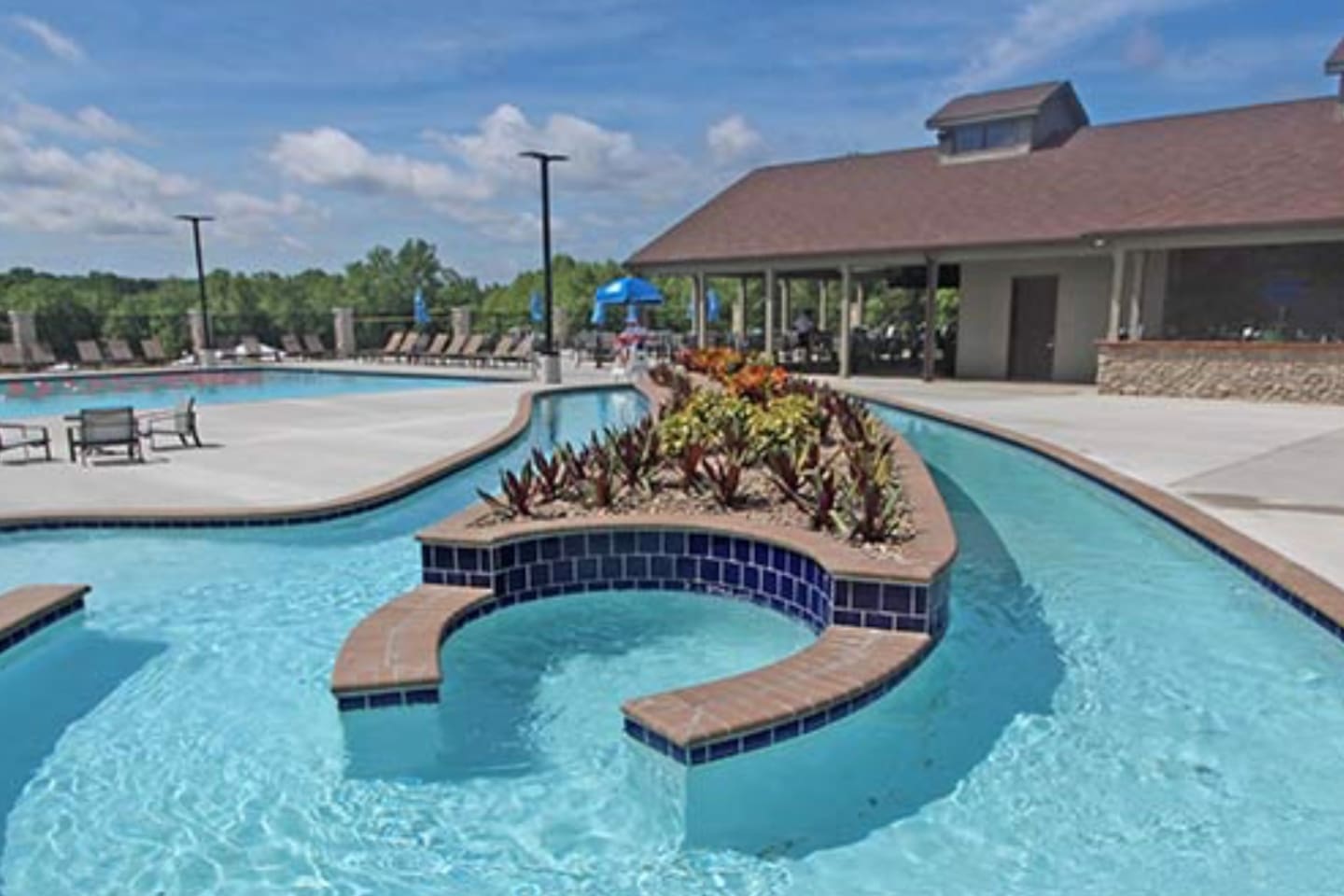Lazy river at the Charrette Creek Commons pool that is available for all registered guests