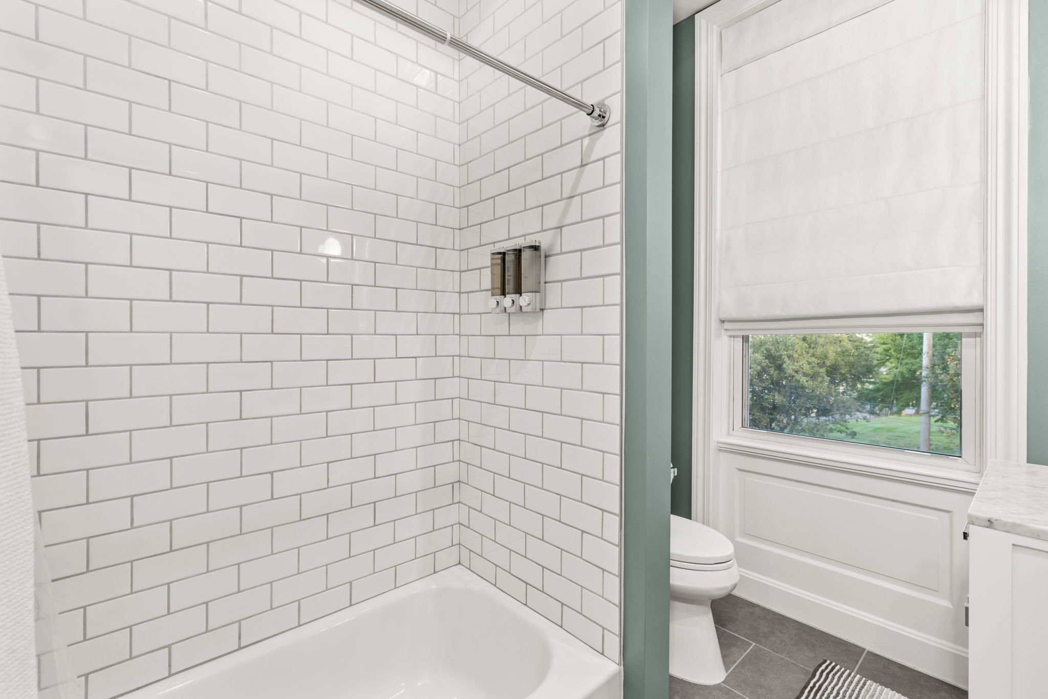 Shared bathroom upstairs provides shower over tub access with spa-like body wash, shampoo, and conditioner to help you relax after a long day or infuse you with energy for the day to come!