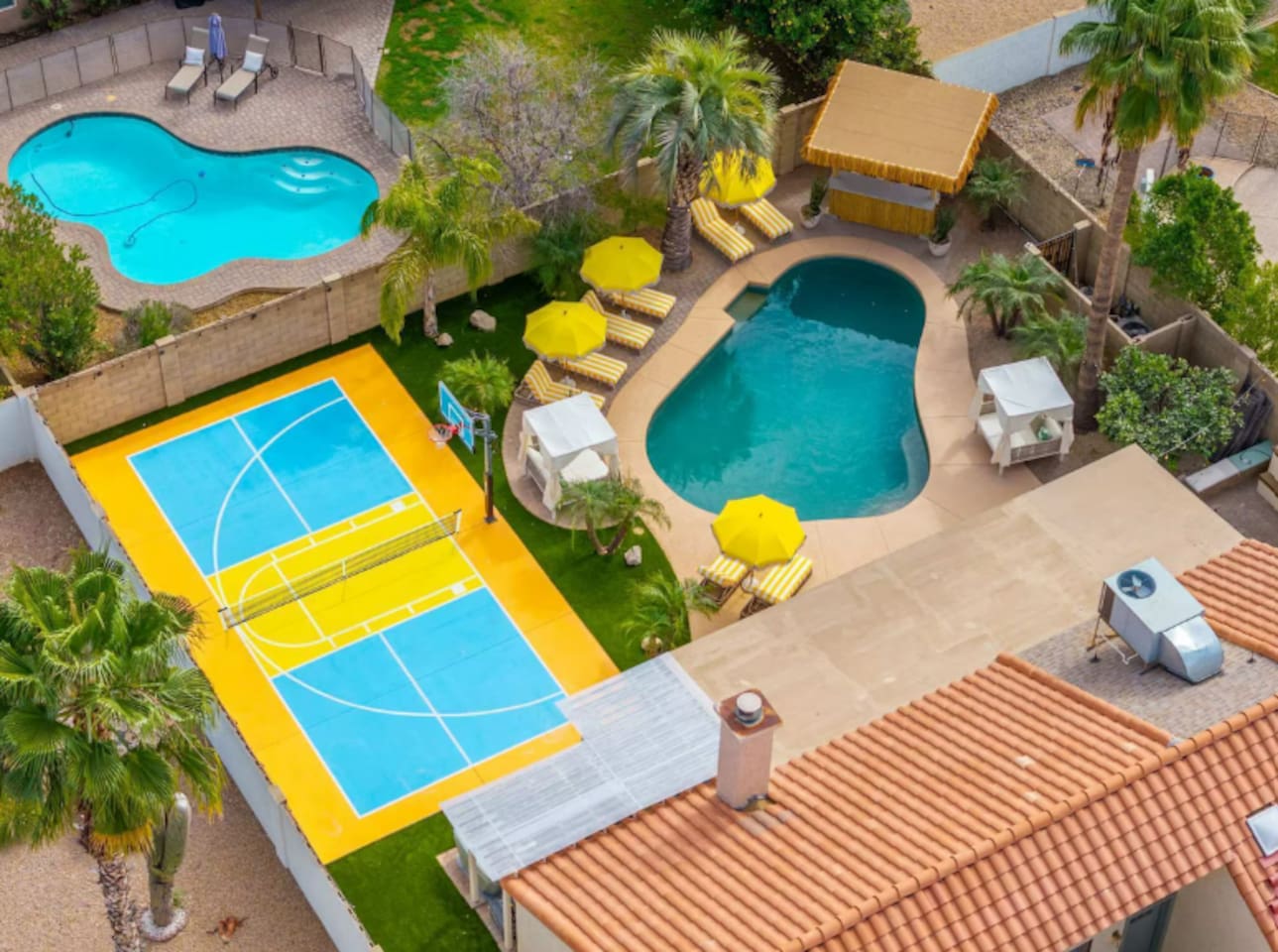 Multiple pools and courts with loungers and umbrellas—ideal for families seeking endless recreation and relaxation options.