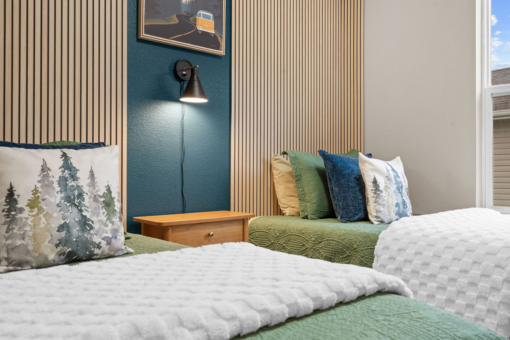 Twin bedroom detail with bedside table