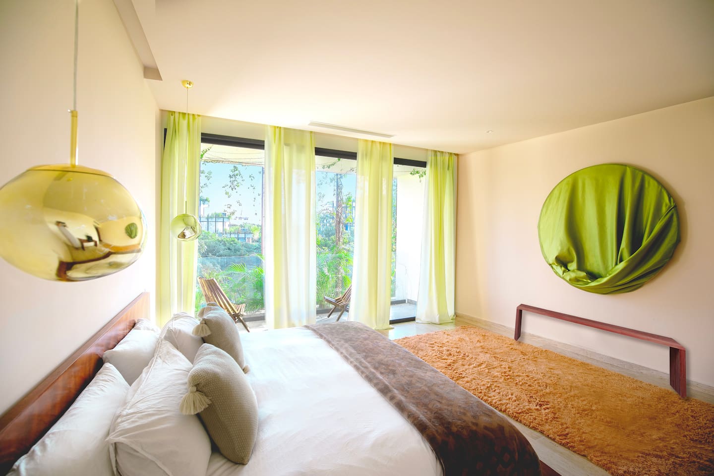 Large bedroom with king sized bed and private balcony, closets and bathroom ensuite. 