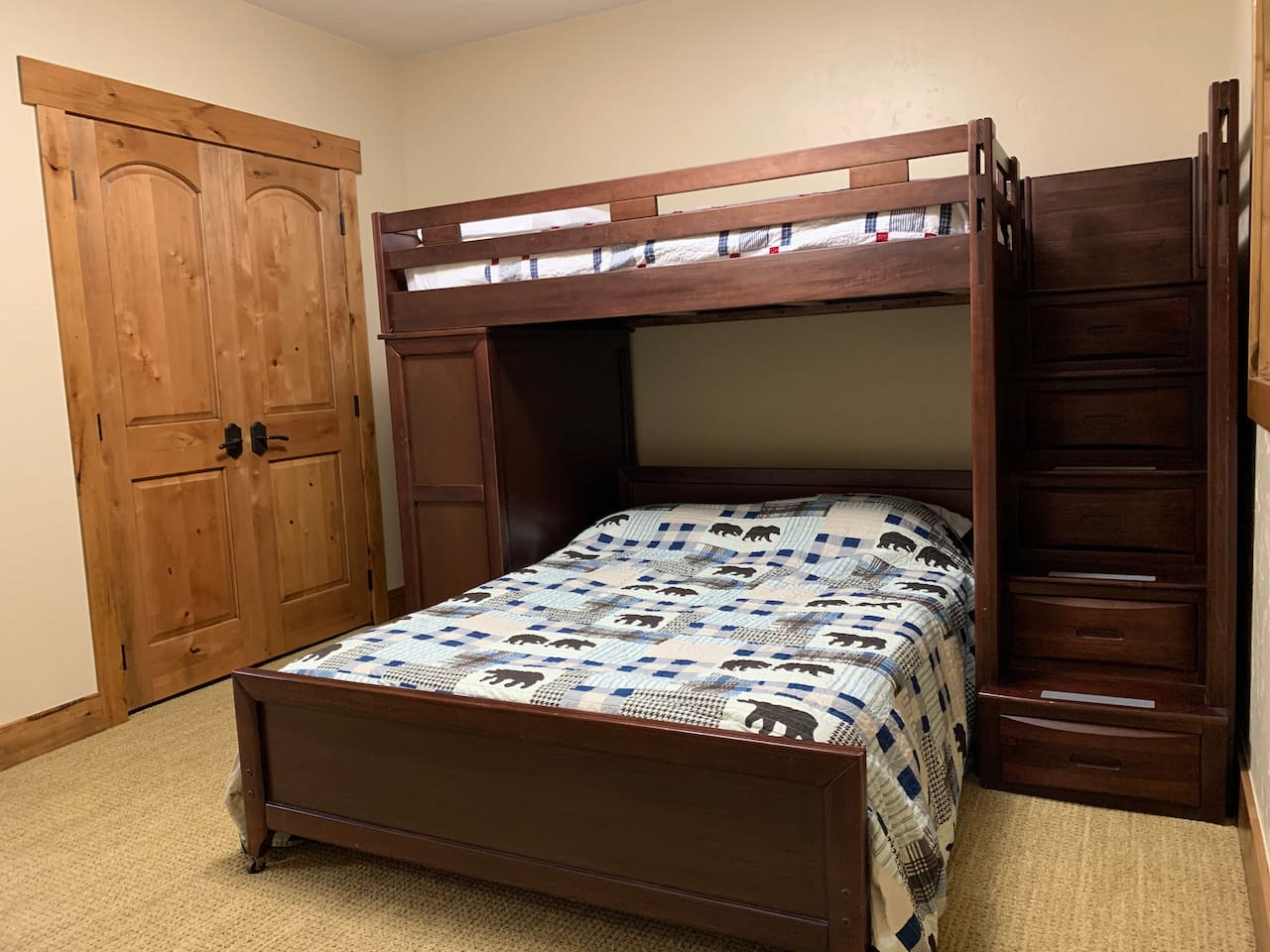 Bedroom 5: basement bedroom with full bed on bottom and twin bed on top