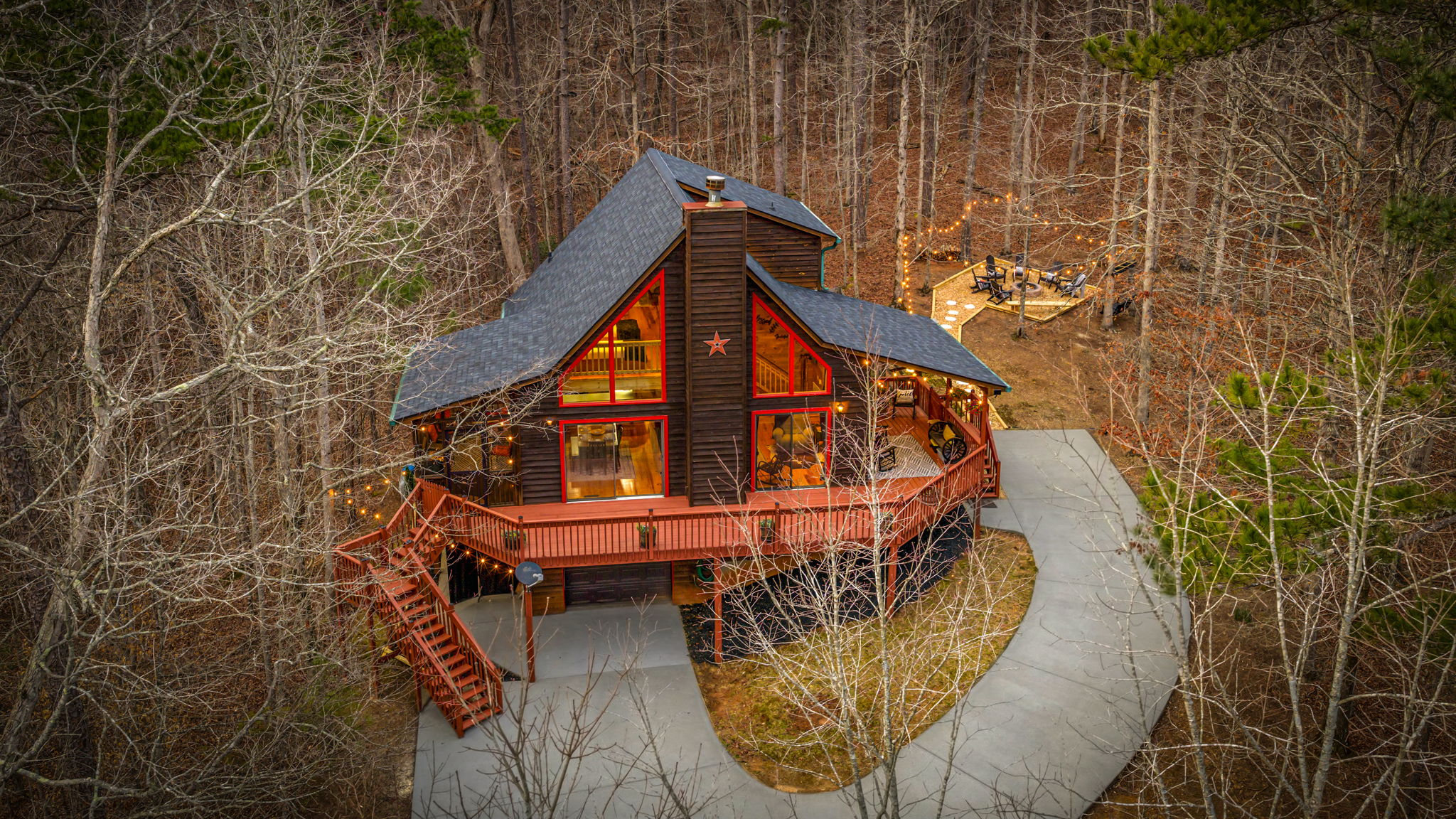 Soft lighting highlights the architectural details and enhances the home’s overall charm.