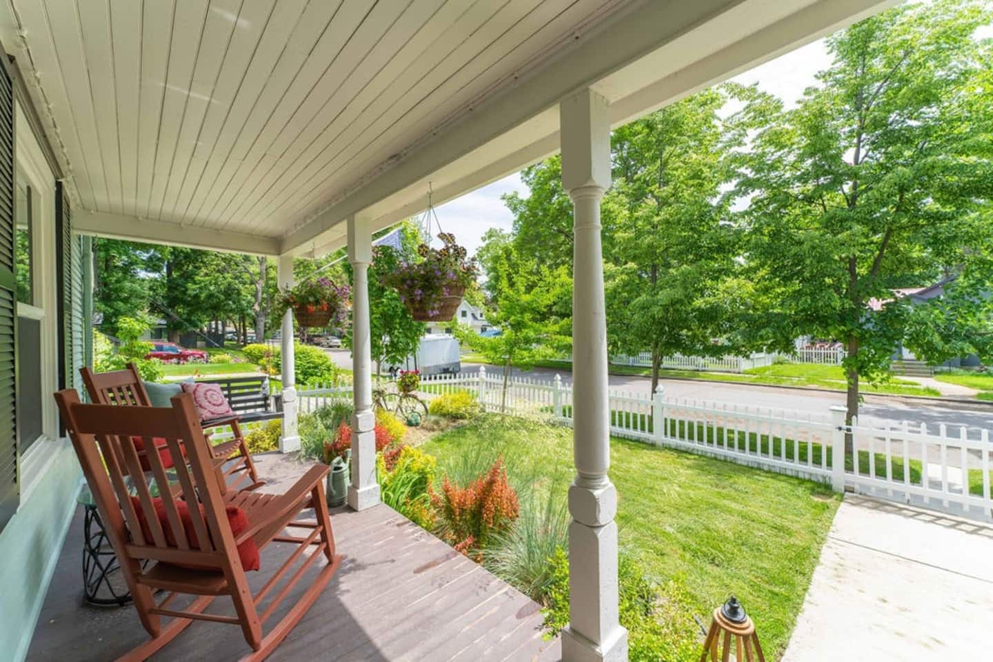 Relax on the porch and soak in the cheerful neighborhood vibe.