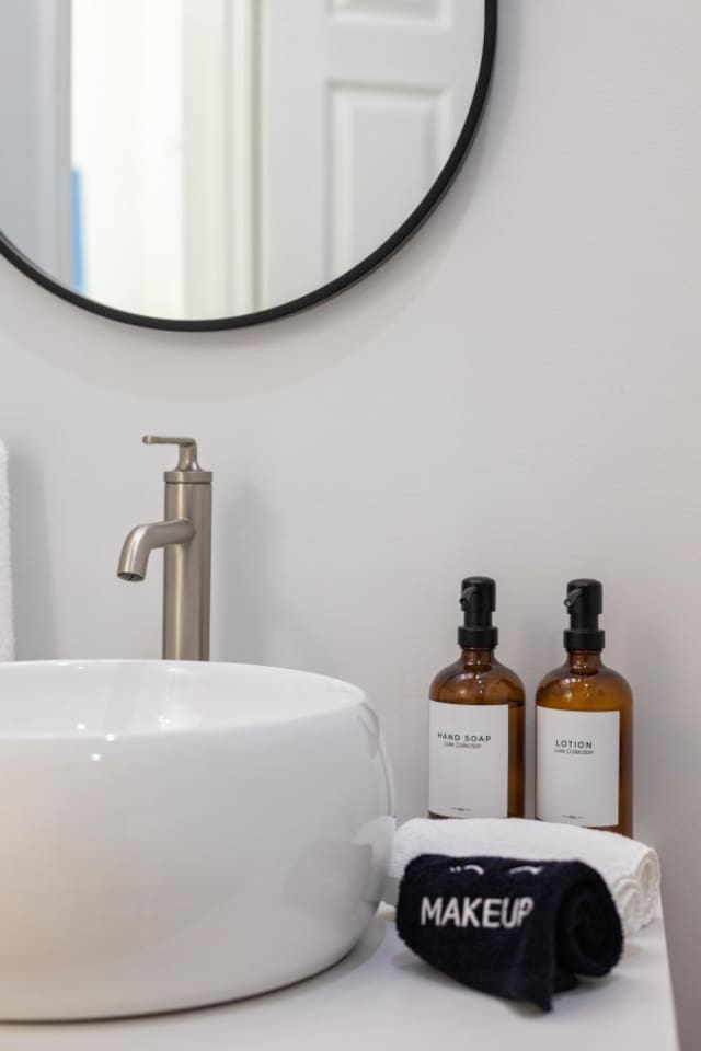 Experience luxury with premium toiletries and plush towels in our pristine bathroom.