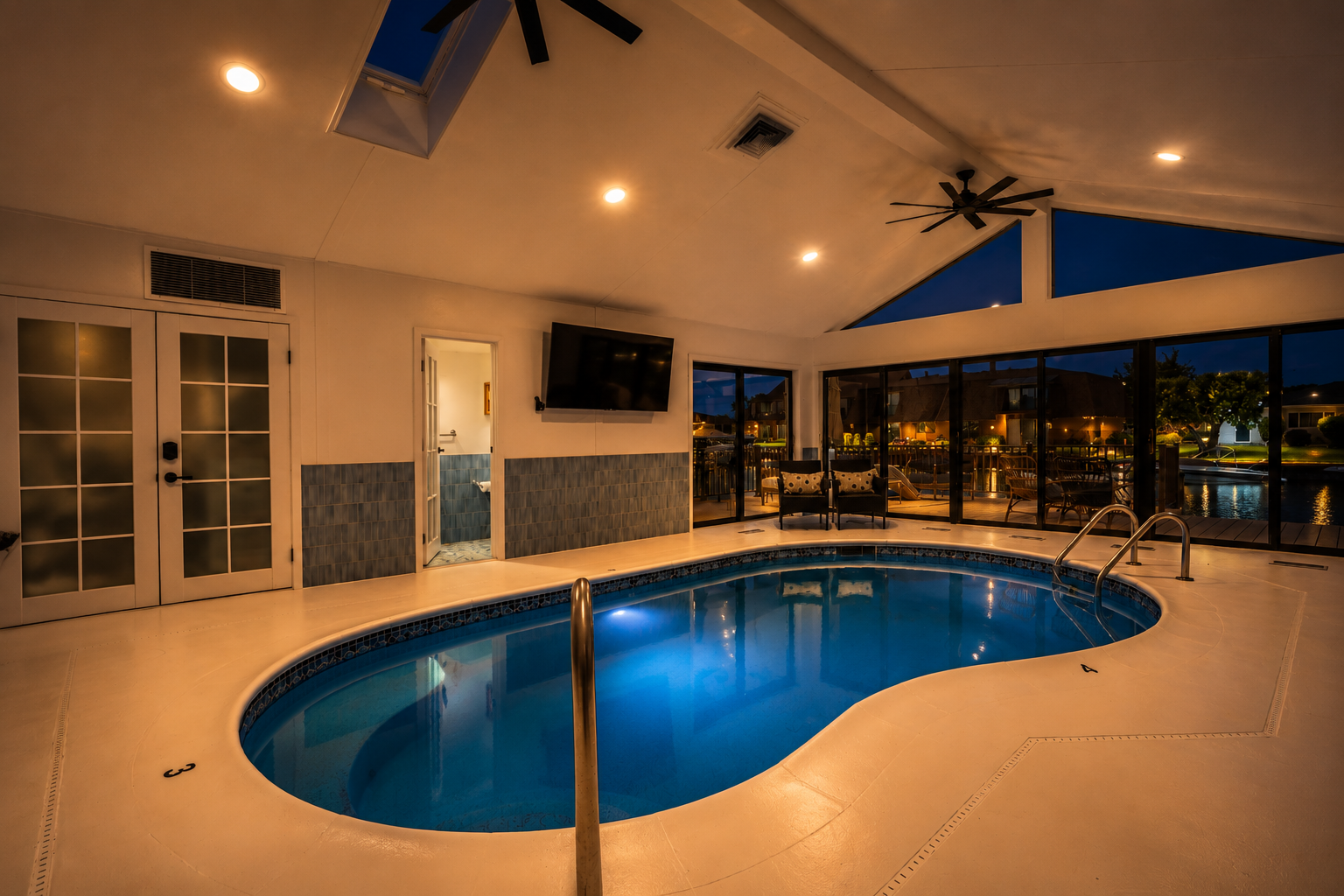 Enjoy the luxury of a private indoor pool overlooking the peaceful waterfront near Lake St. Clair. Whether you're starting your morning with a swim or unwinding in the evening, this inviting space is perfect for year-round relaxation.