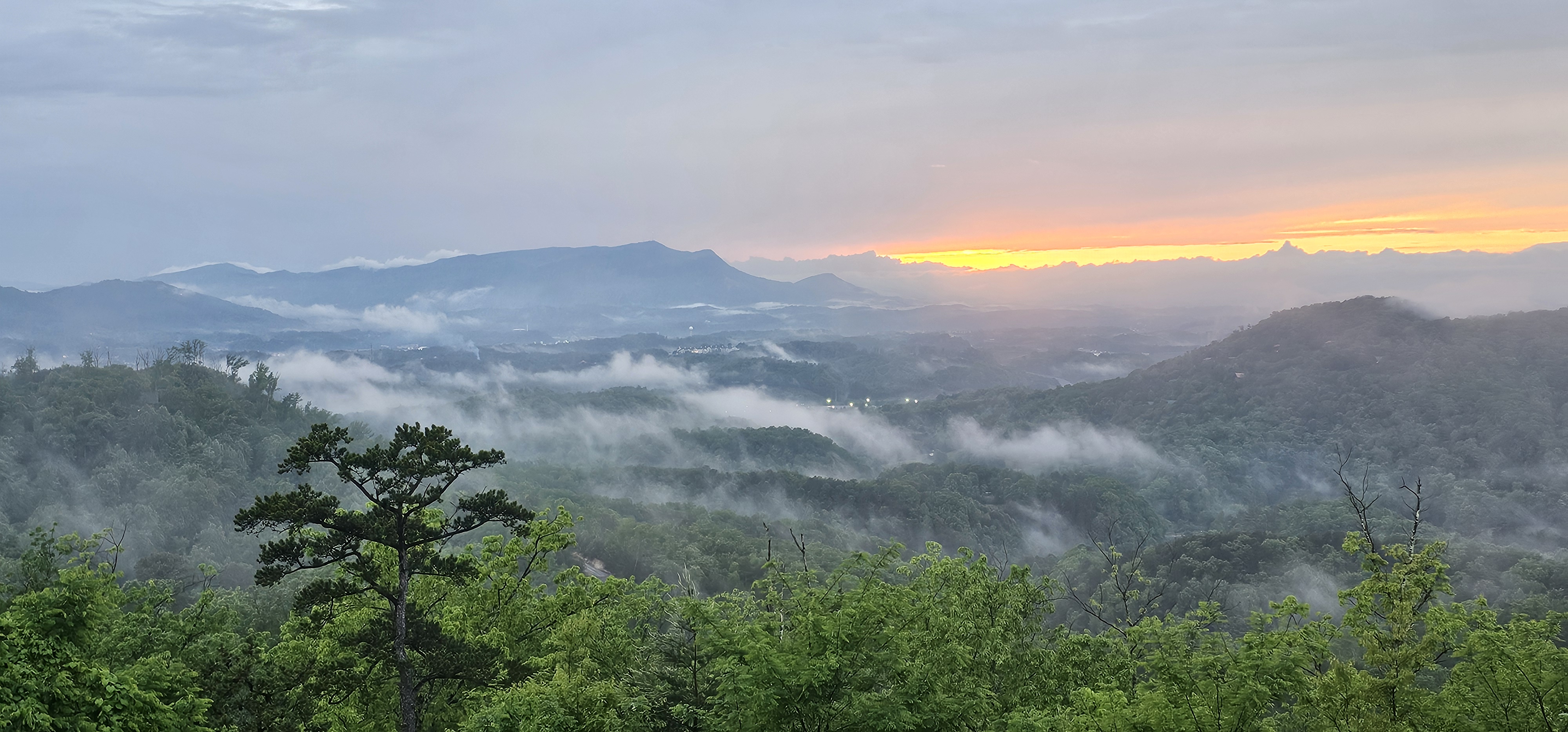 Smoky Mountains and sunset views never get old from the cabin!