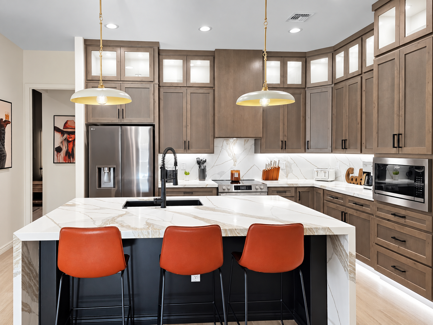 Oversized kitchen island with barstools.