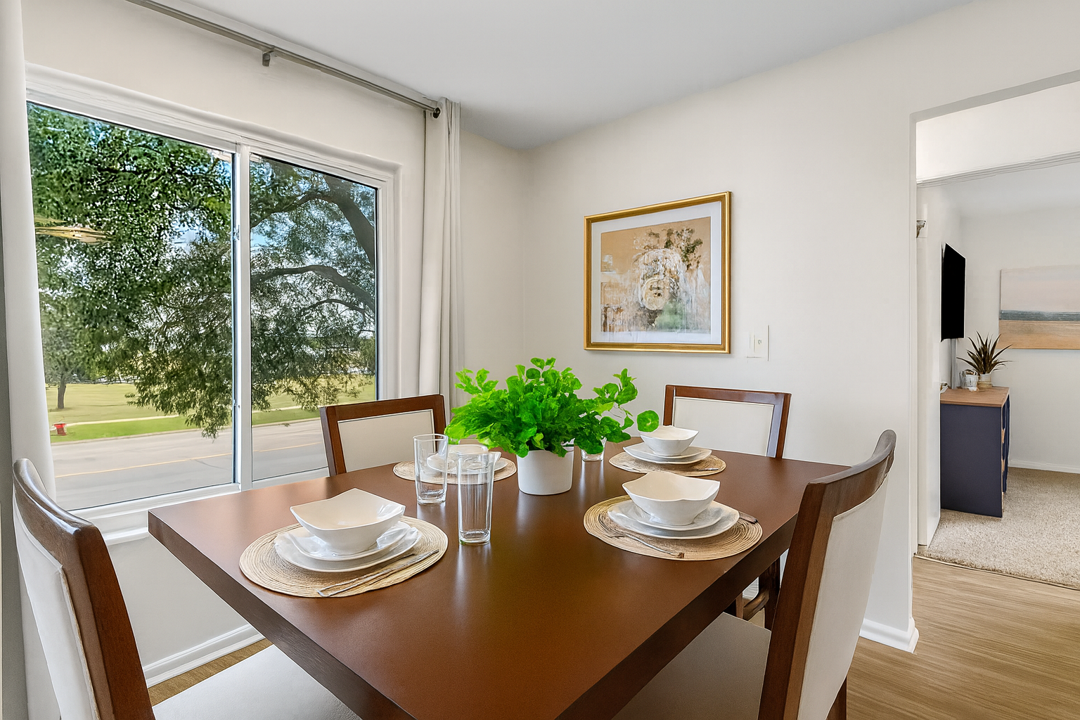 Open-concept layout connecting kitchen, dining, and living areas for effortless entertaining.