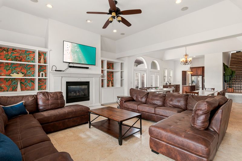 Spacious living room featuring a 70" Smart TV