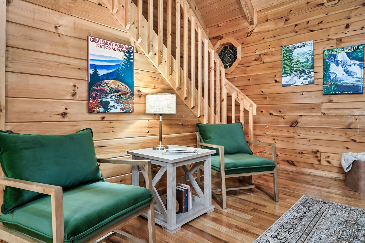 Extra seating in living room. Stairs lead up to upper level king suite.