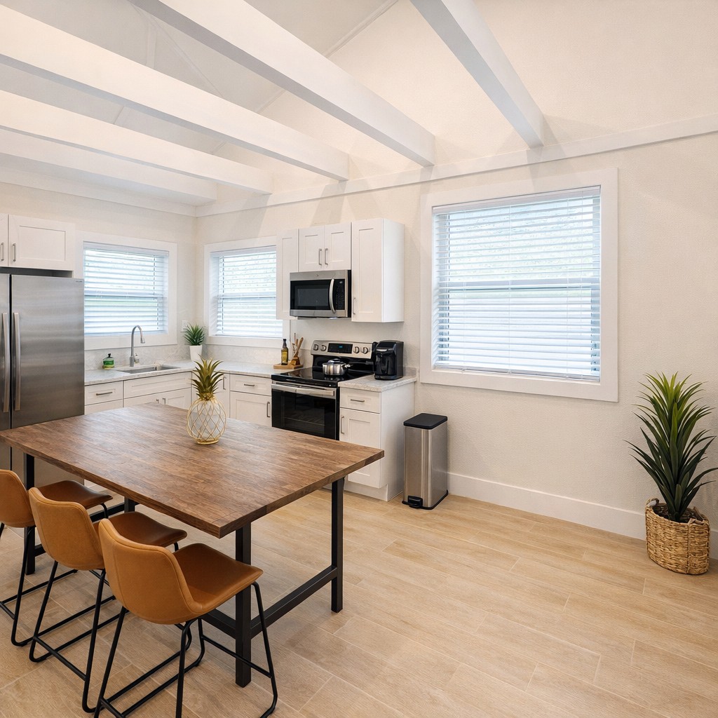 Dining room with vaulted ceilings. Create and eat amazing meals with this fully stocked kitchen