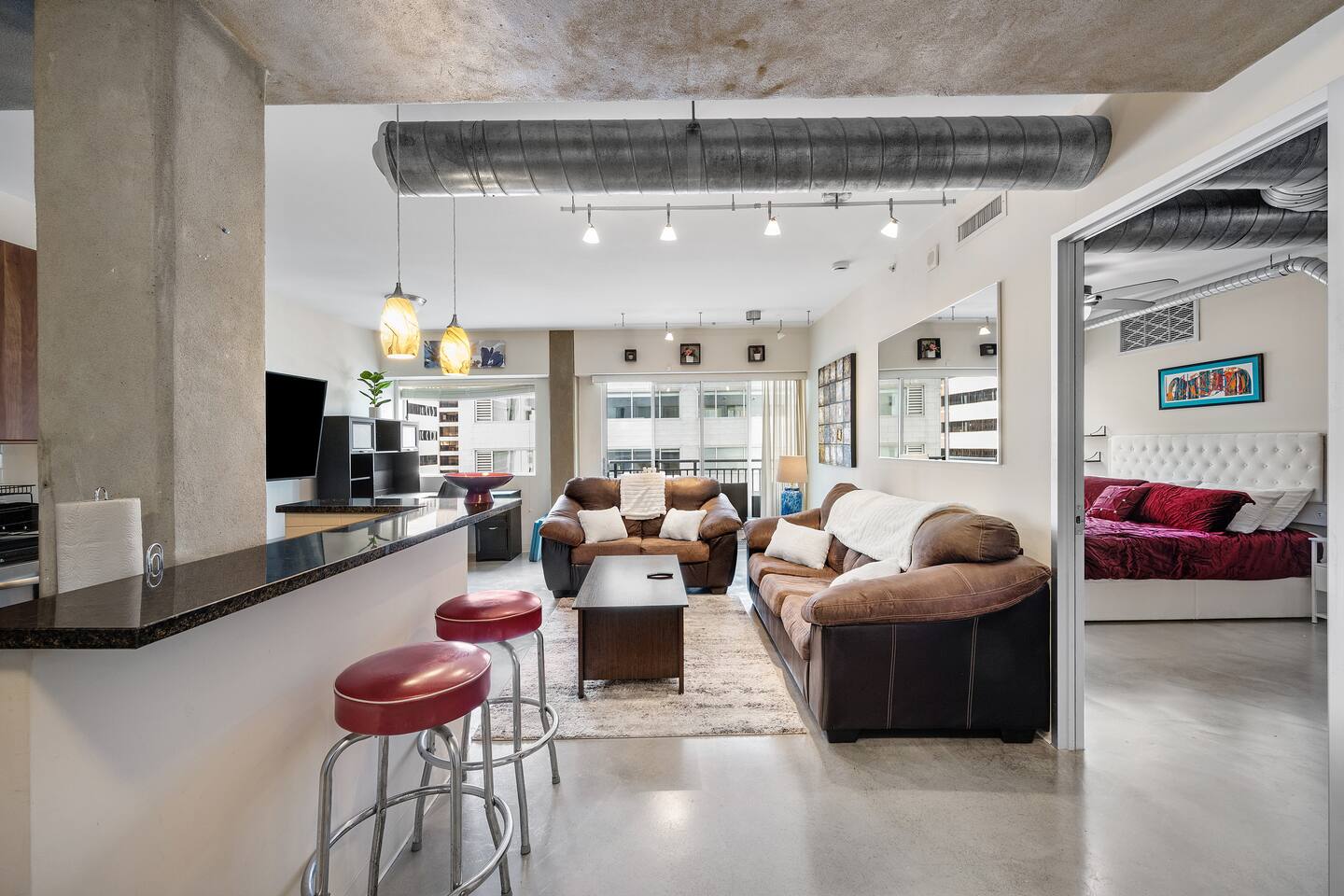 Spacious living room with 65" Curved TV