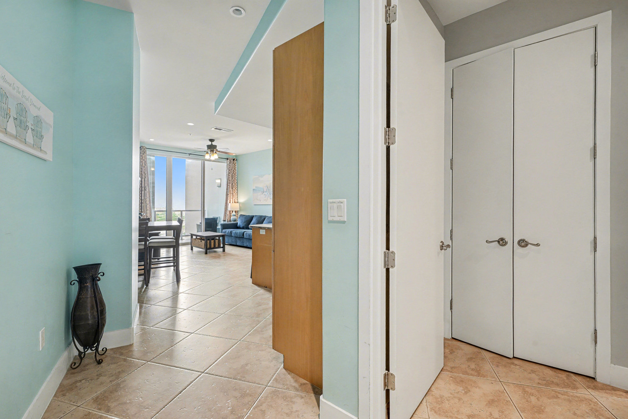 Laundry with full sized stacked washer/dryer