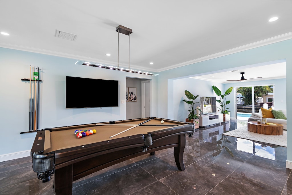 New pool table with another TV with Roku, Xfinity, and hundreds of live channels