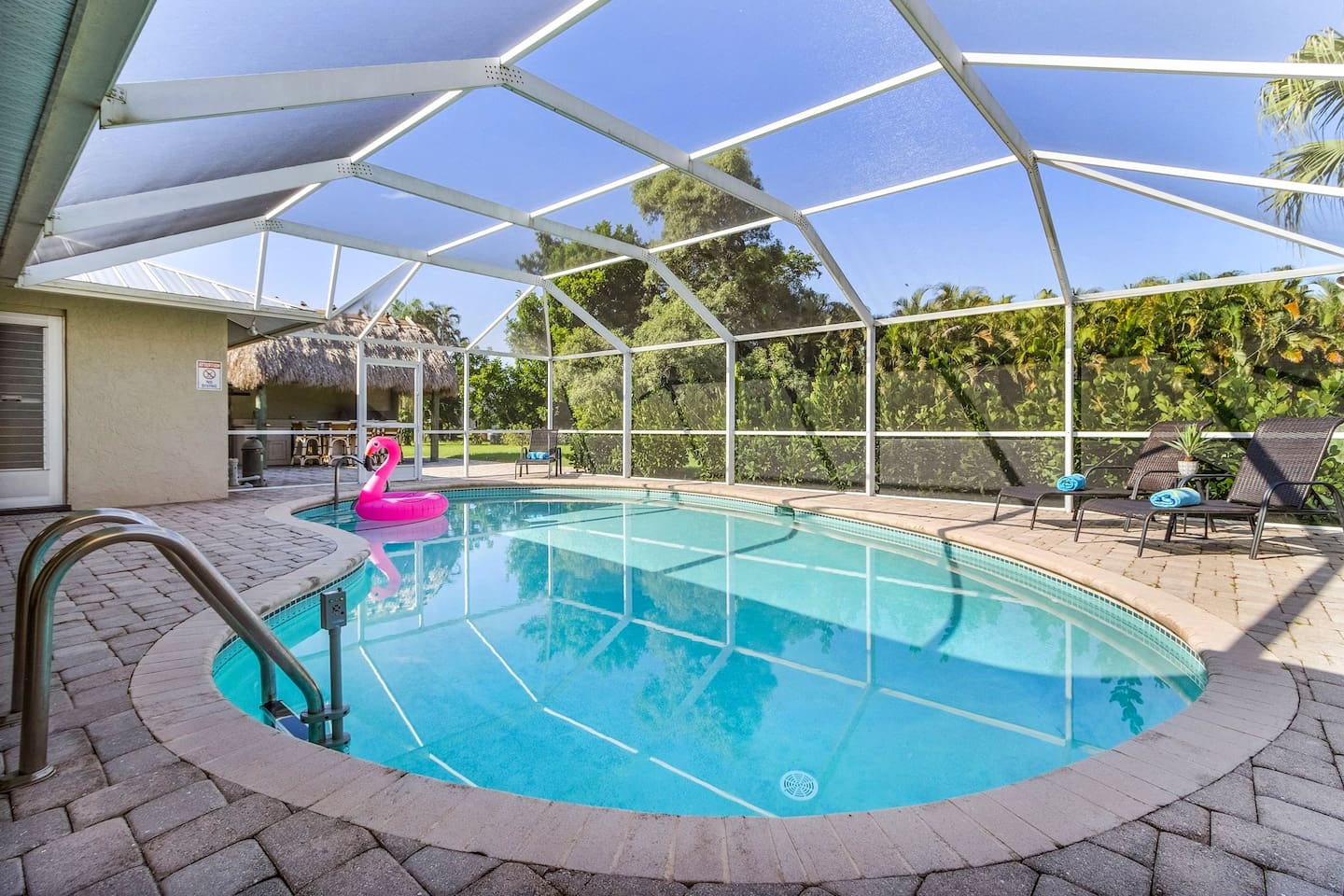 Immerse yourself in pure bliss with our crystal-clear pool—ideal for endless fun and relaxation under the Florida sun!